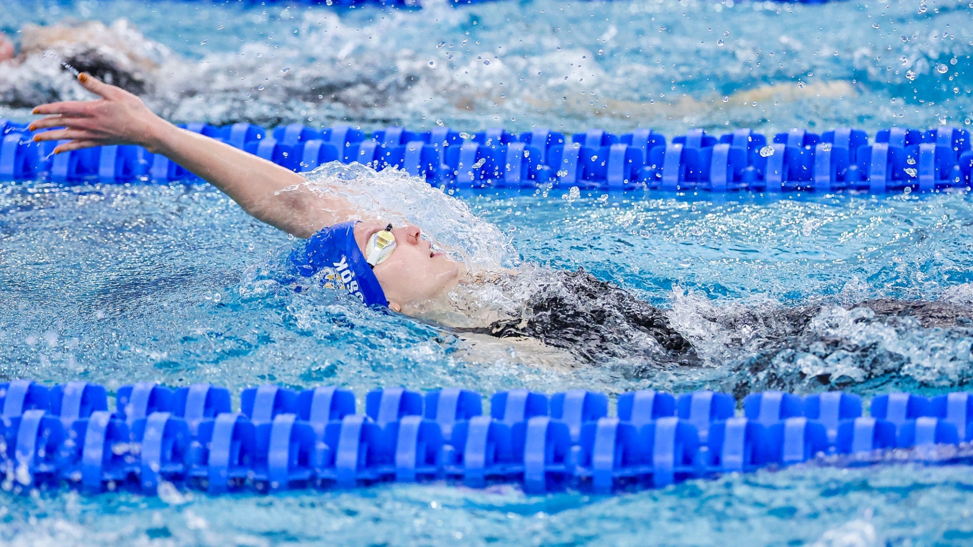 Dorka Dancsok swims backstroke at the 2025-26 NCAA Championships