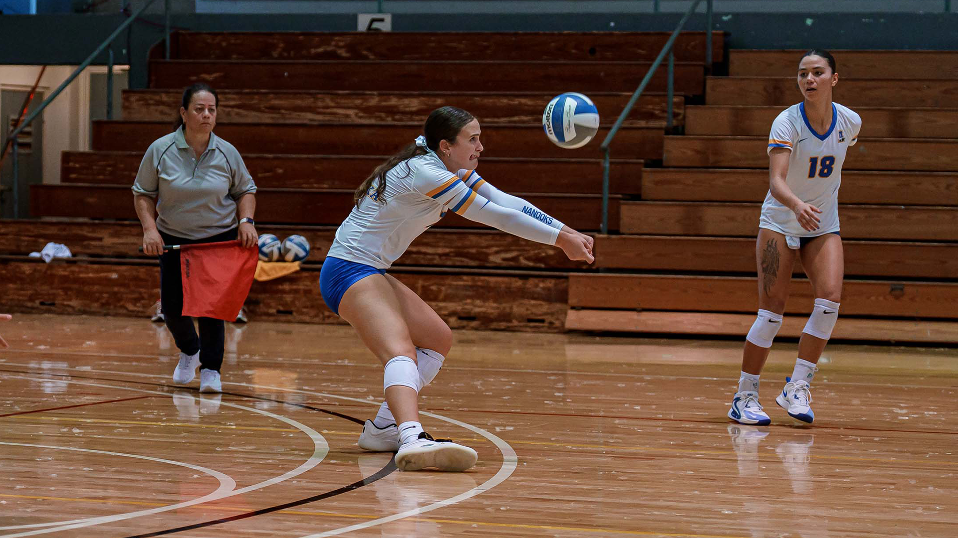 Kellan Flynn on the serve receive against Chaminade