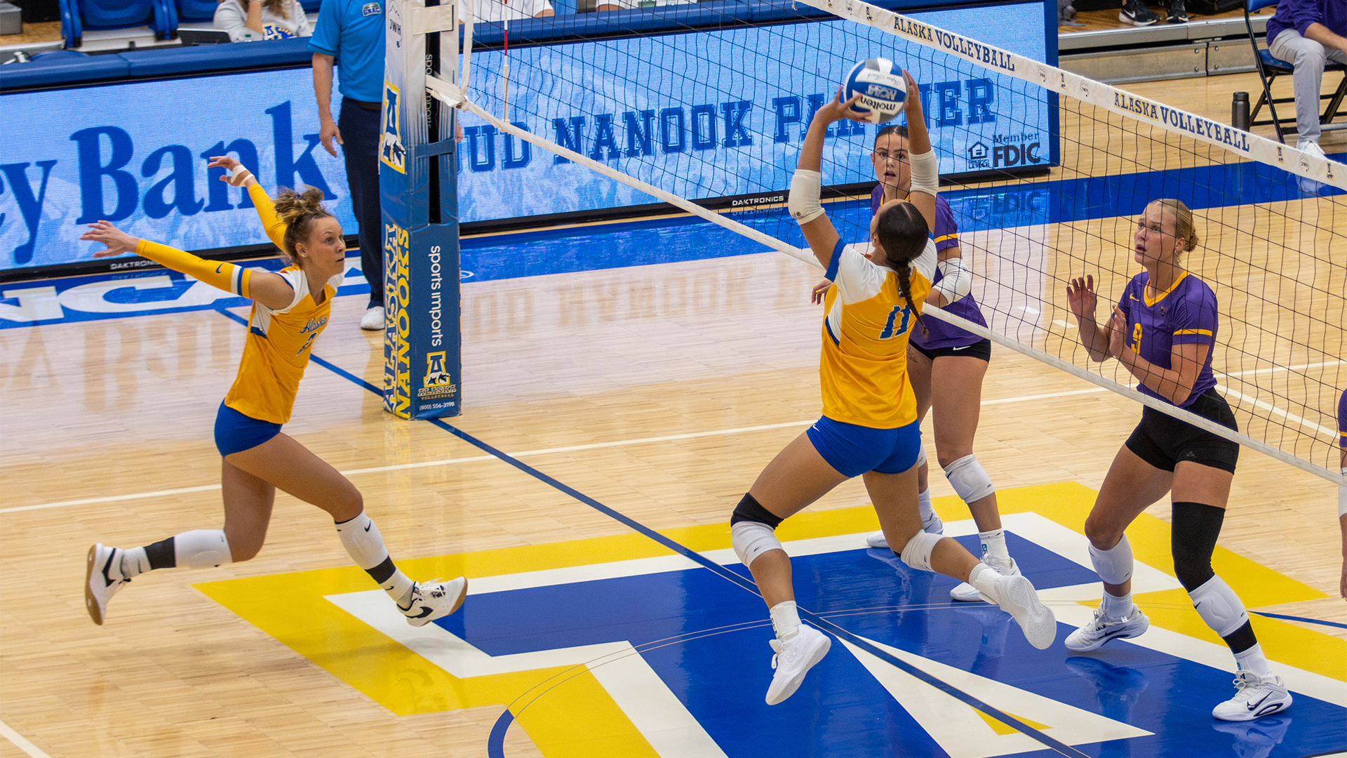 Cynphany Henderson sets up Presley Engelauf on the attack against Mankato