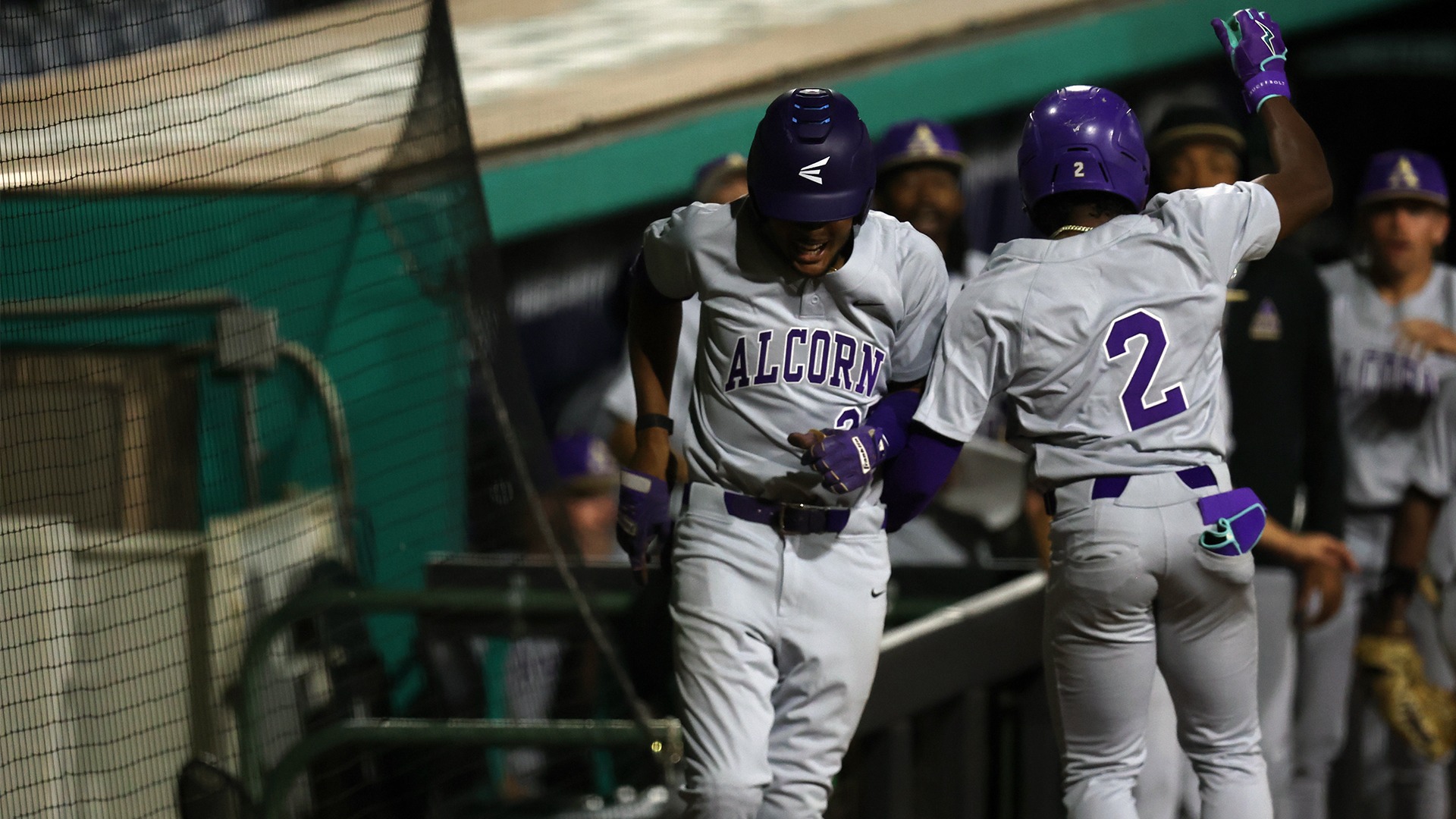 Baseball Jump Celebration Near Dugout at HBCU Power Series