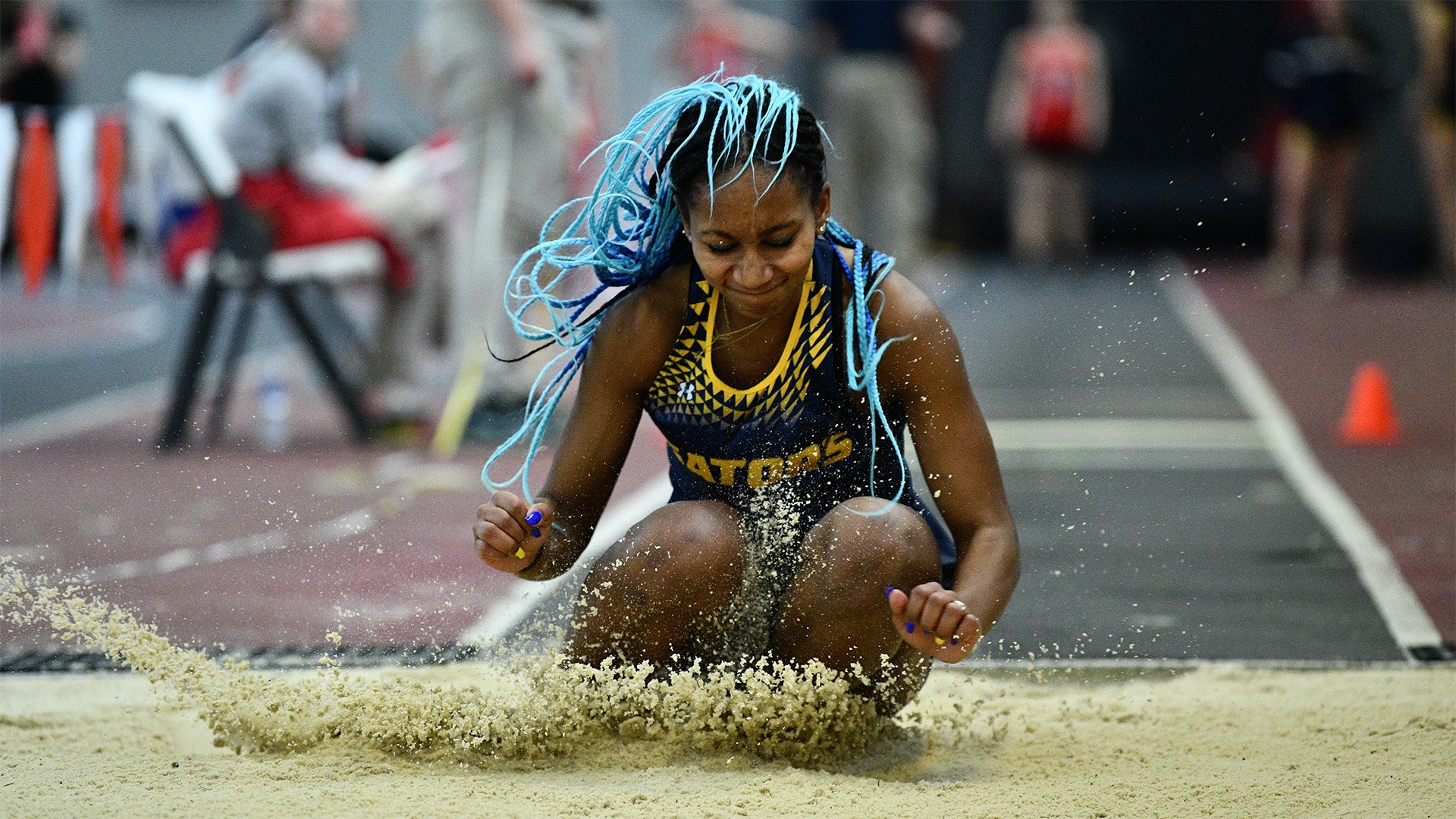 Evie Ellenberger lands jump at 2025 PAC Indoor Track & Field Championships, Feb. 27, 2025. Photo by Robert Hayes.