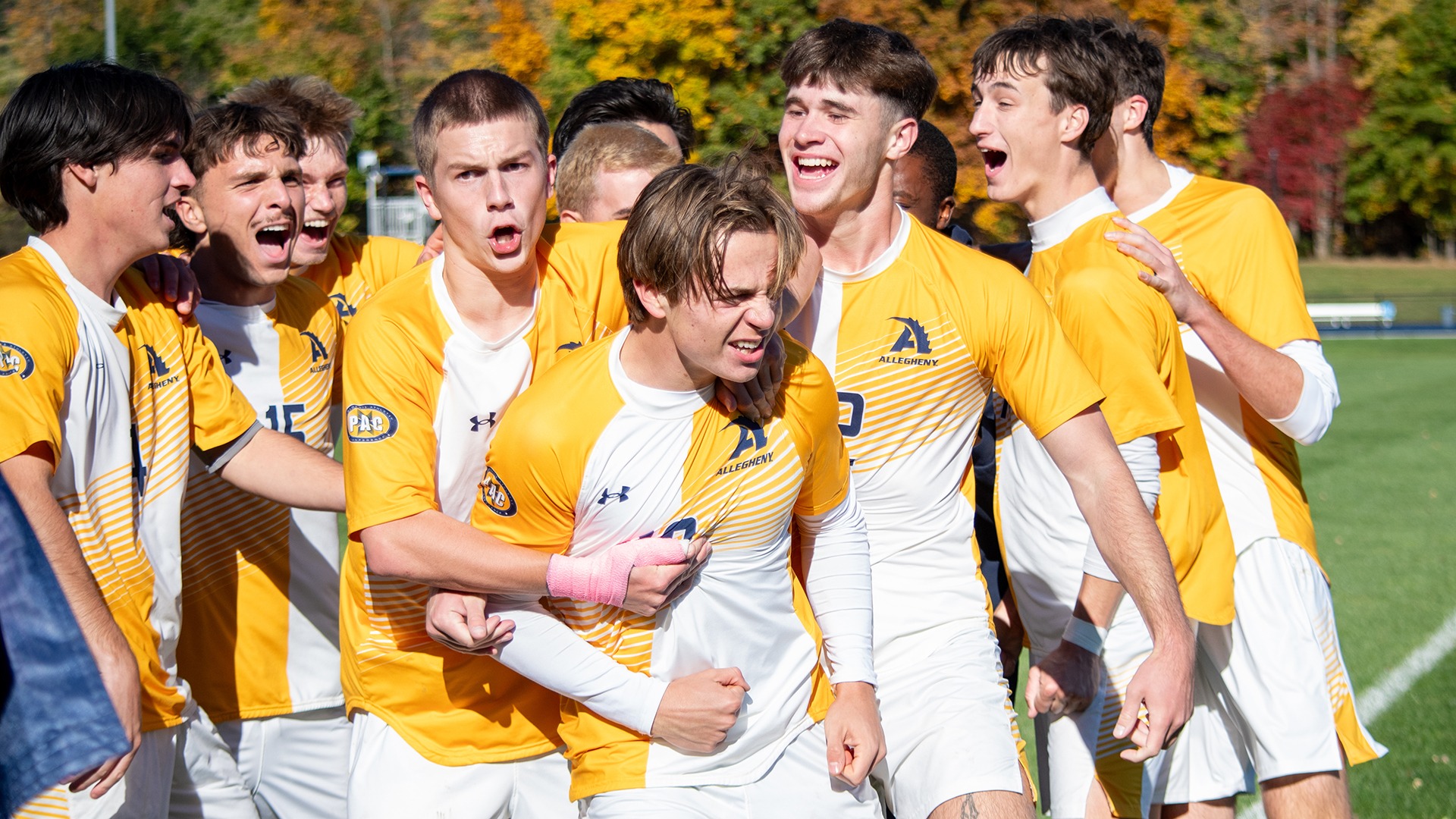 Cooper Euziere celebrates a goal against Grove City