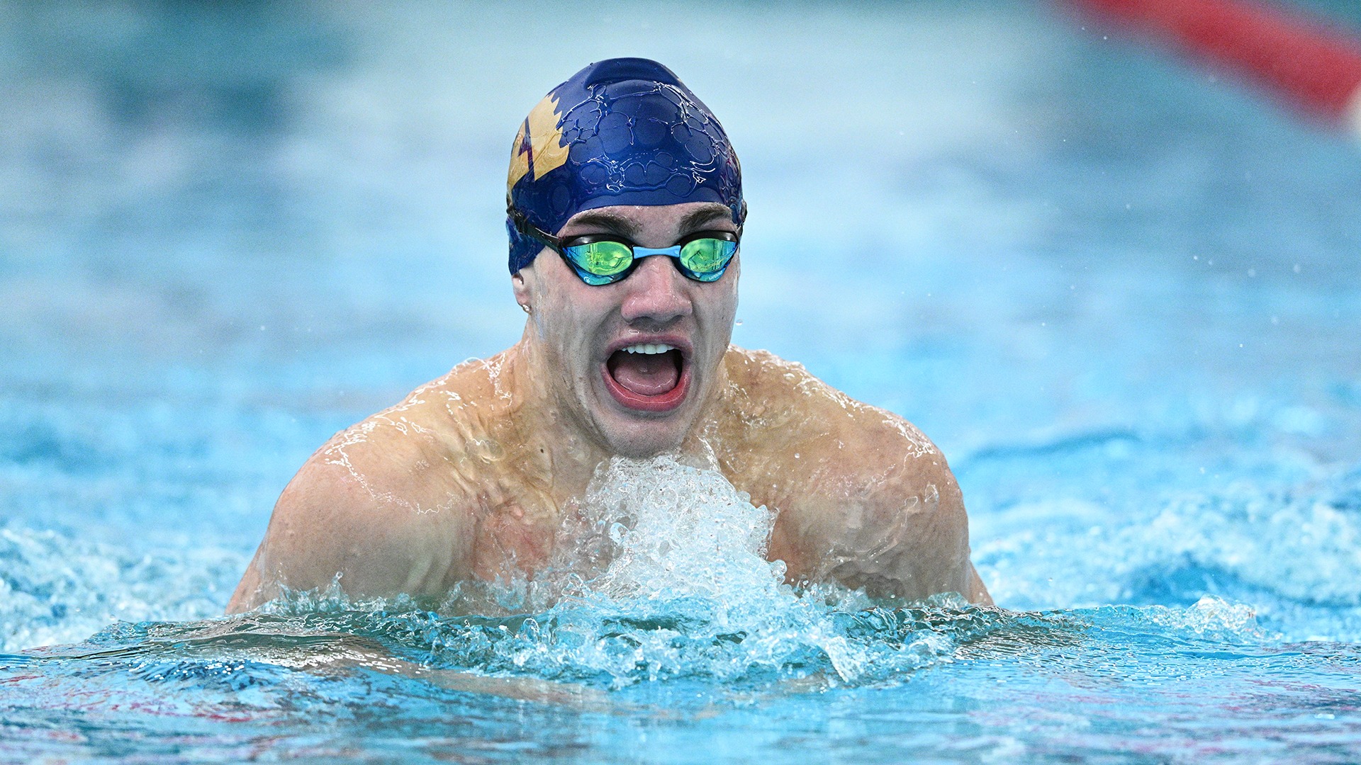Christian Habusta competes in the 100 breaststroke at the PAC Championships.