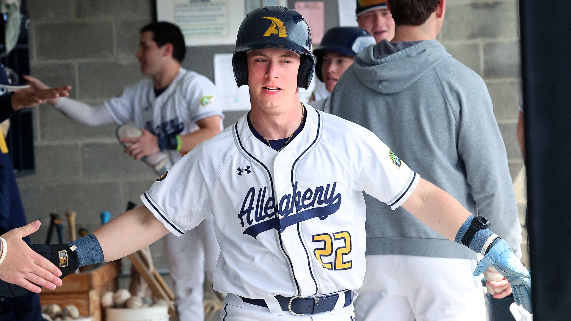 Ty Eberhardt celebrates a run against Waynesburg