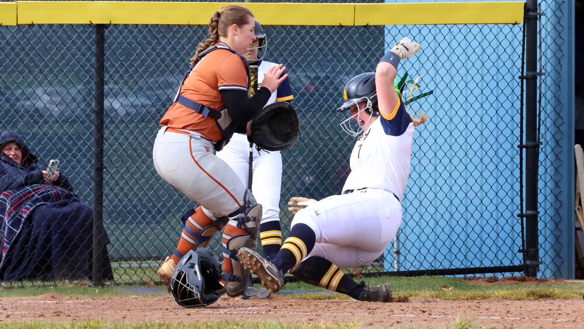 Samantha Phillips slides into home against Waynesburg