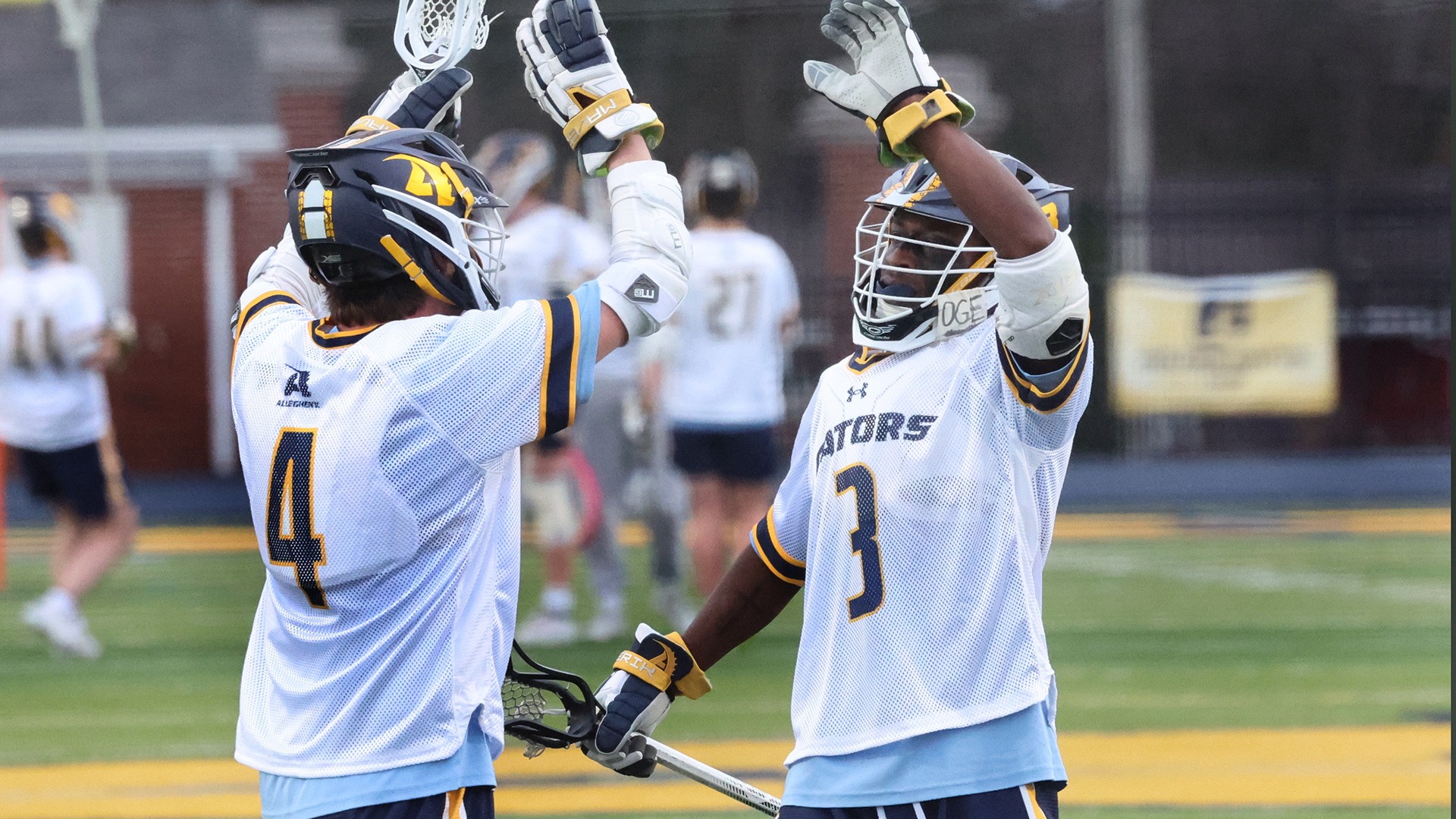 Pearl and Hopkins celebrate a goal