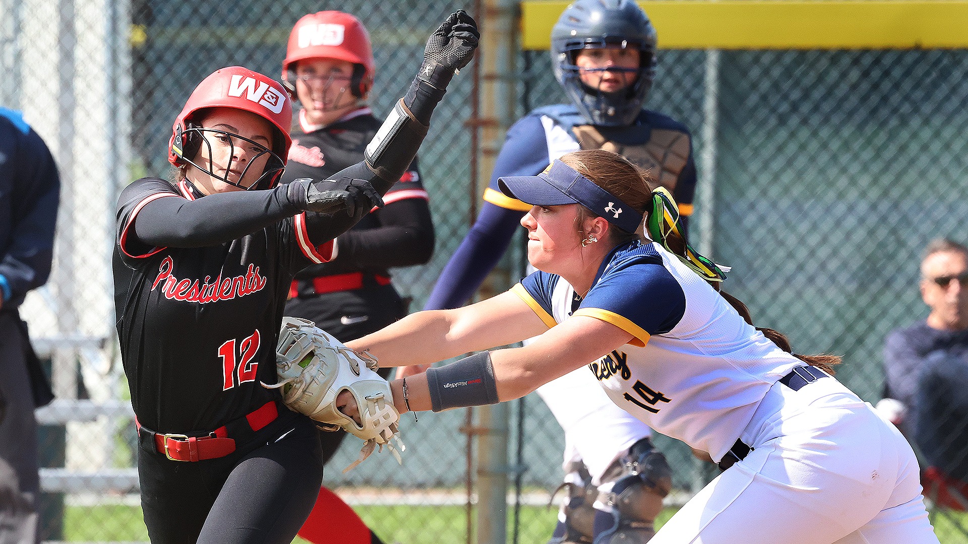 Morgan Kinney tags out a W&J runner