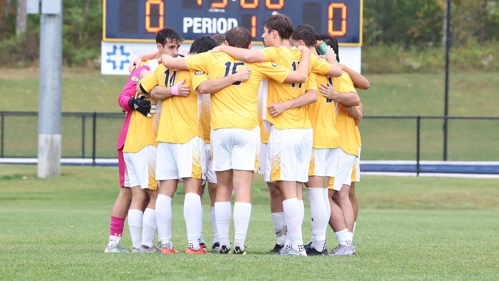 Men's Soccer huddles before their game against Chatham