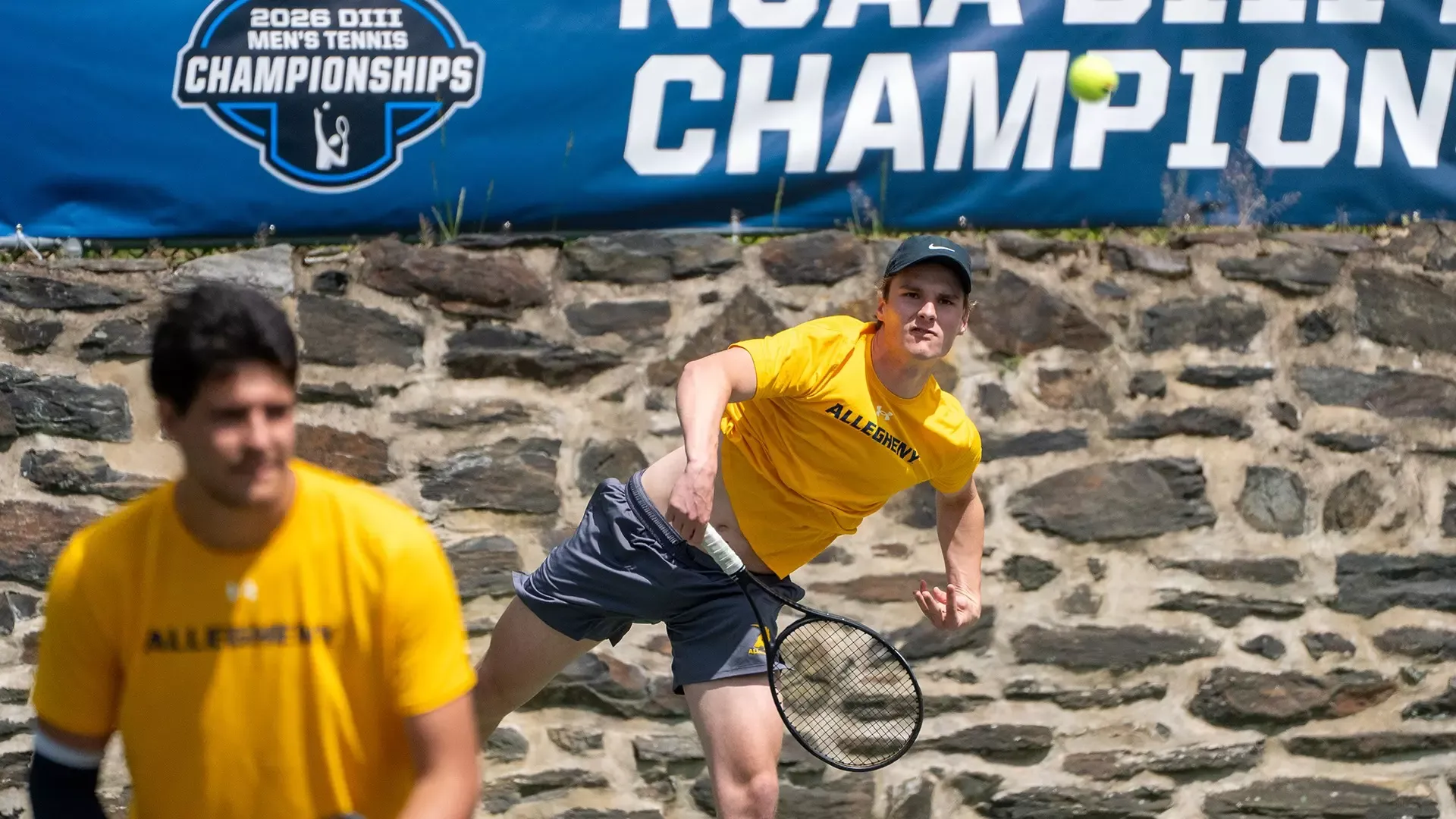 Olivier Erkens serves in doubles match vs. Penn State Behrend in NCAA First Round, May 8, 2026. Photo courtesy of Swarthmore Athletics.