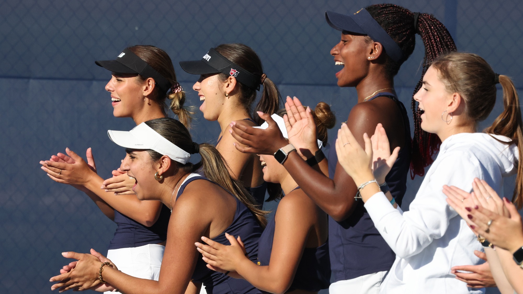 Women's tennis cheers on team vs. Grove City, Oct. 1, 2025. Photo by Ed Mailliard.
