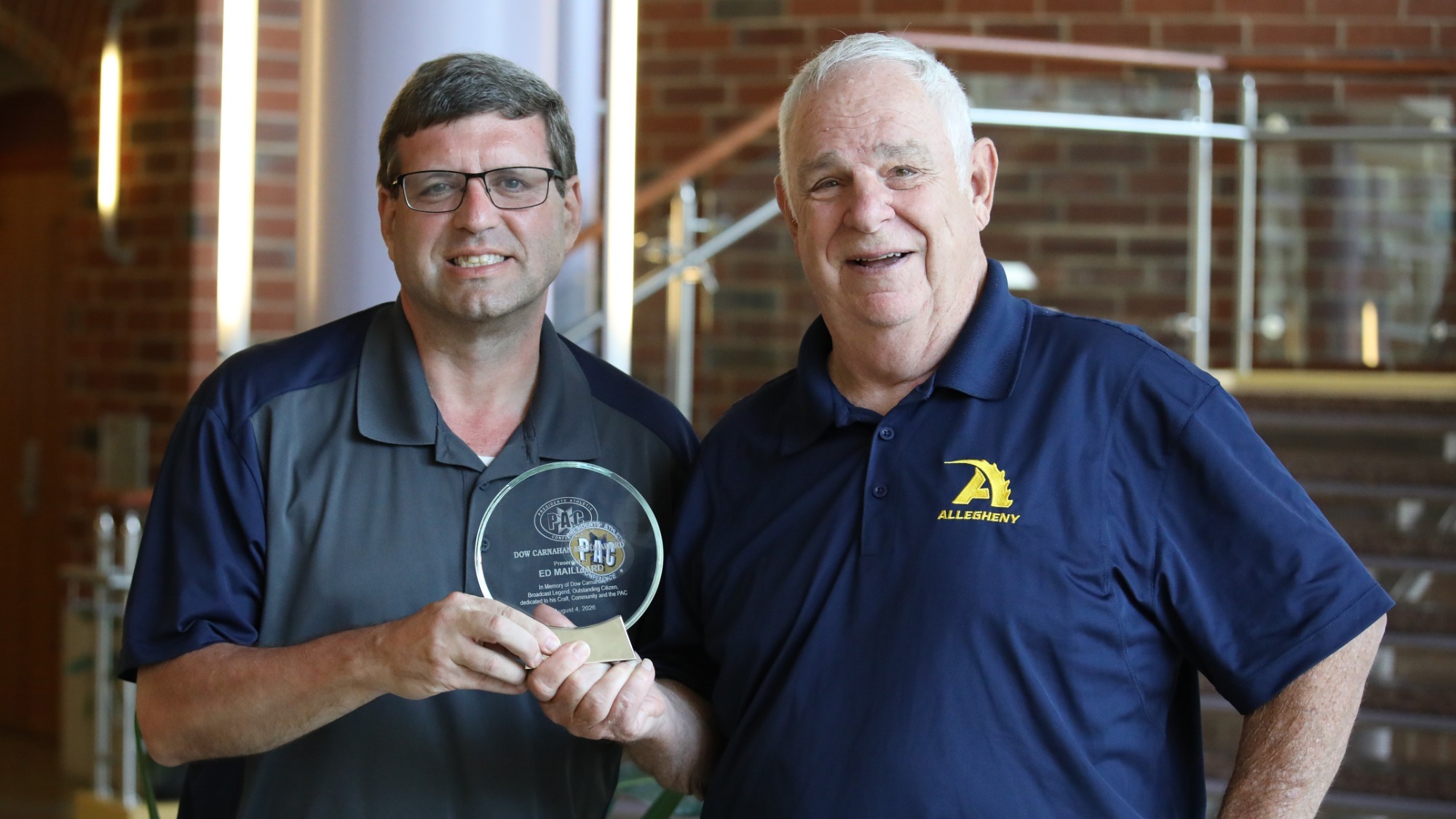 Joe Onderko (L) and Ed Mailliard (R) with the 2026 PAC Dow Carnahan Award at PAC Football Media Day, Aug. 4, 2026. Photo by Travis Larner.