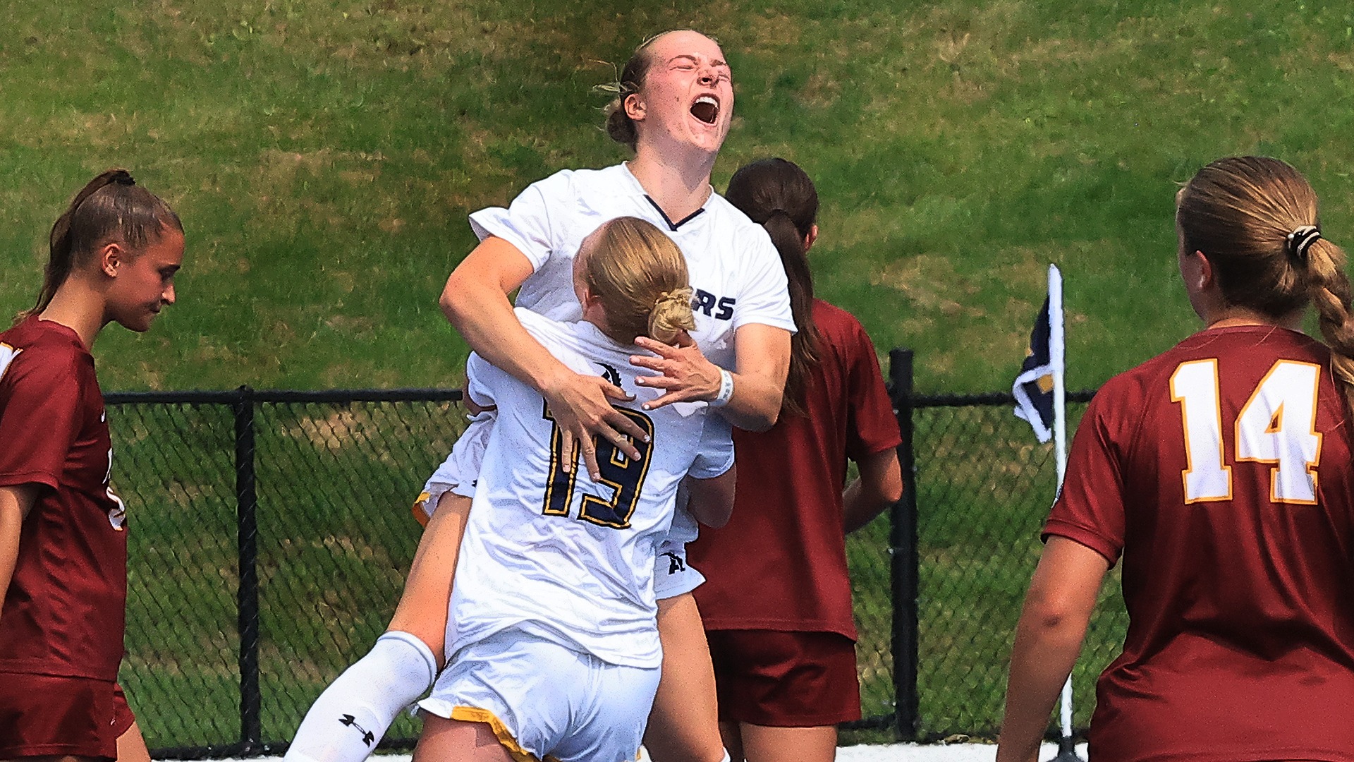 Katherine Surdykowski celebrates a goal against Saint John Fisher.
