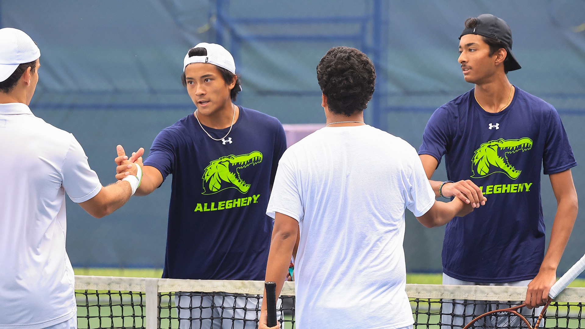 Logan Memije (L) and Arjun Murali (R) shake hands with opponents after doubles match, Sept. 13, 2026. Photo by Ed Mailliard.