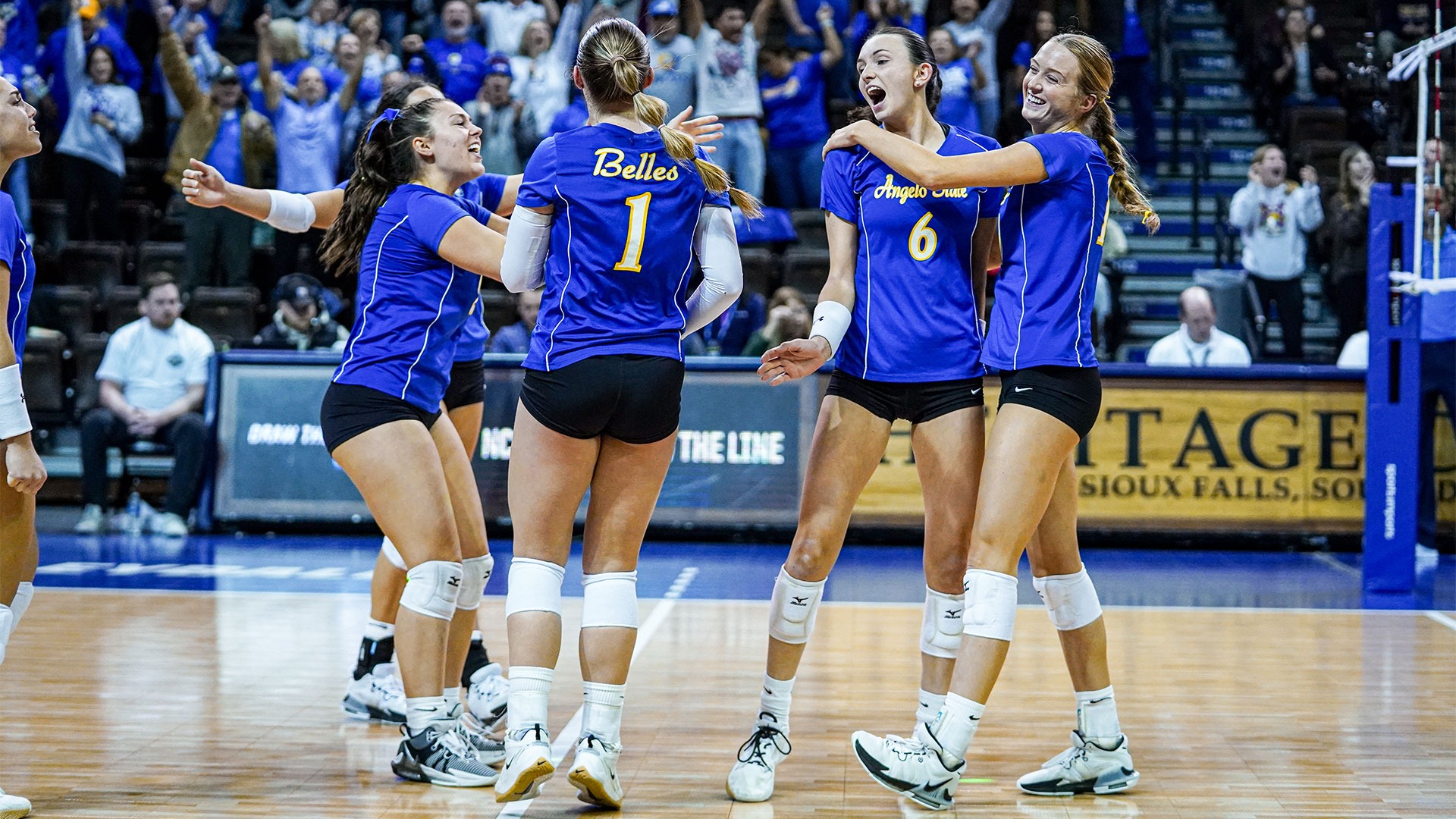 The Belles celebrate after scoring a point vs. Gannon.