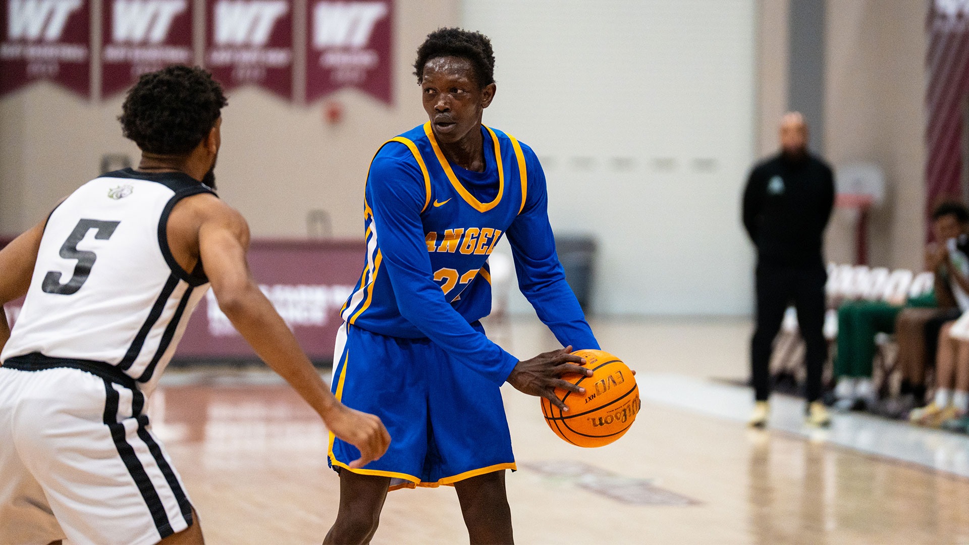 Ashraf Barsham passes the ball vs. Justice