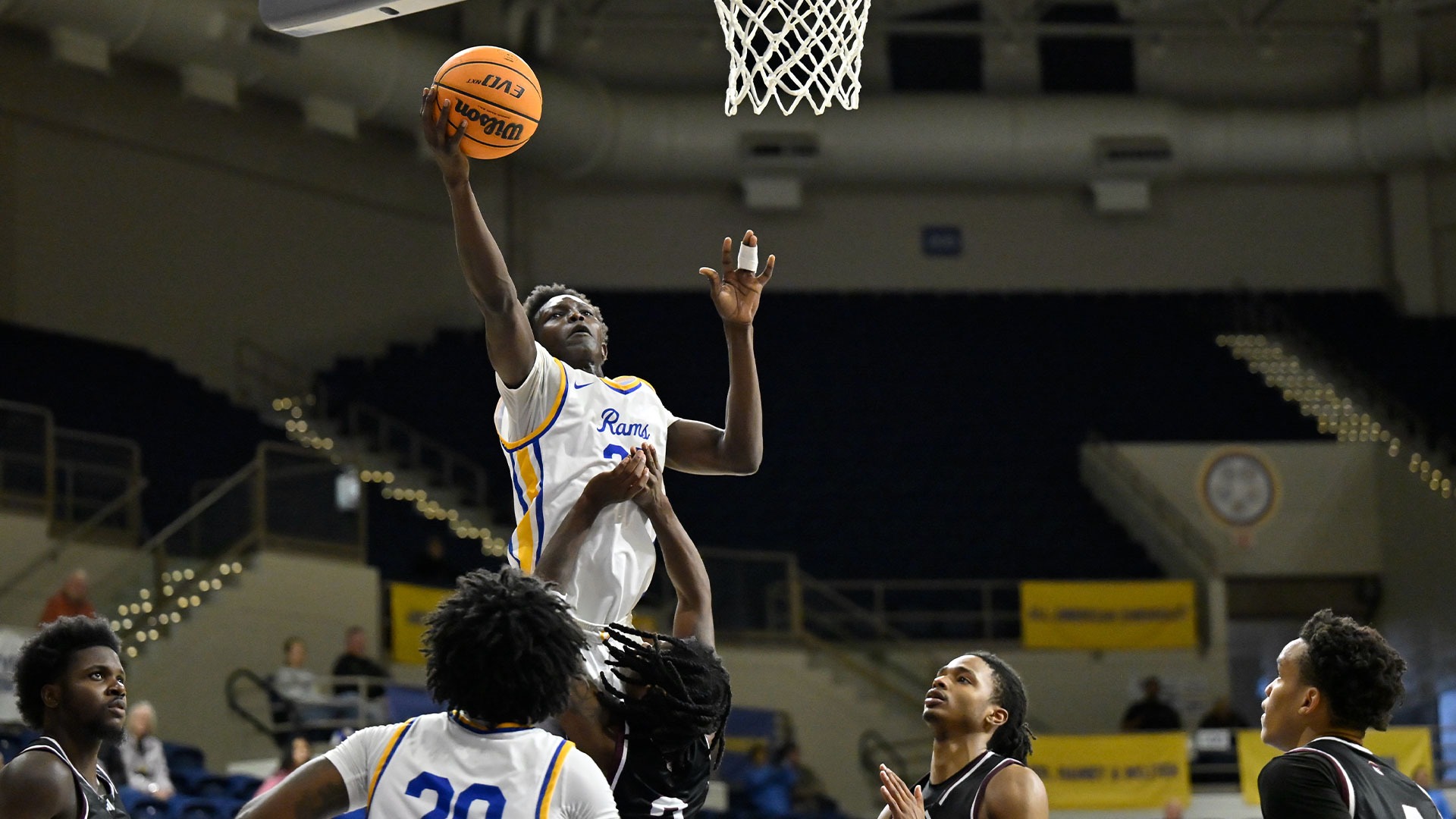 Ashraf Barsham shoots a layup vs. TAMIU