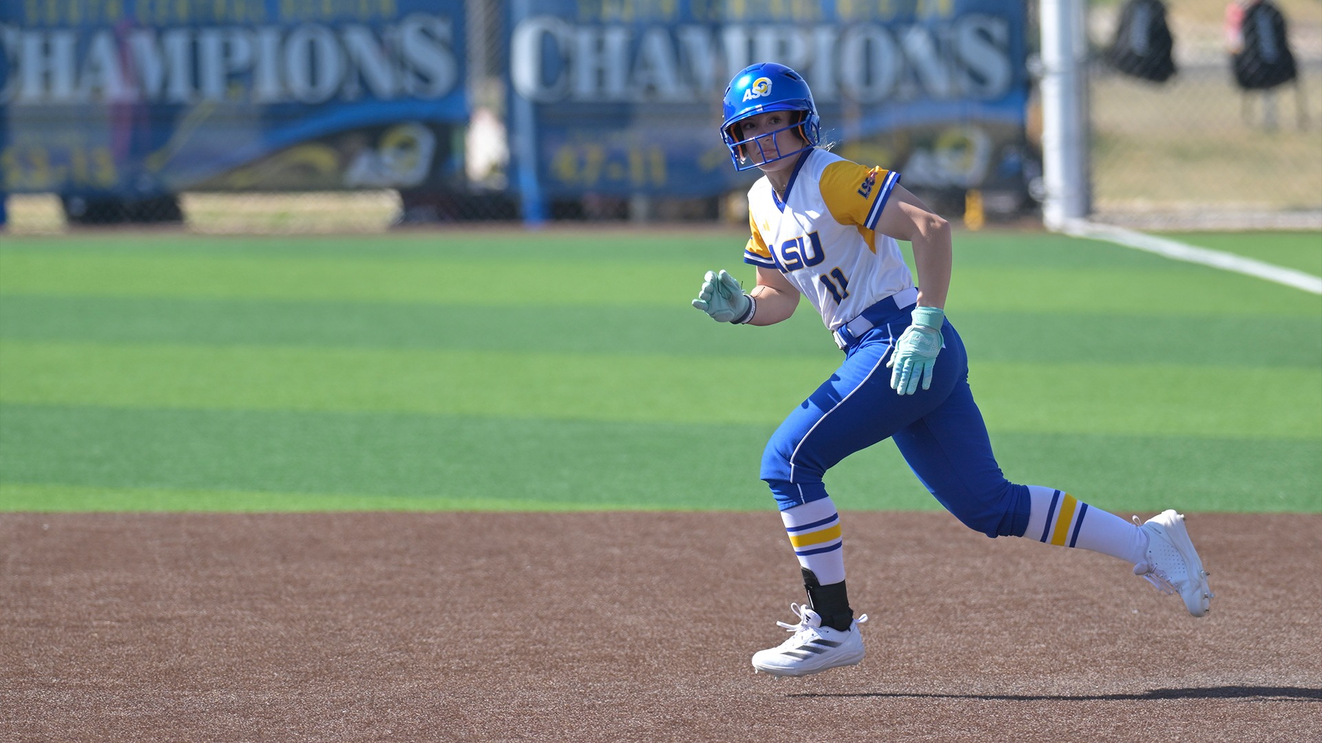 Paris Brienesse runs off first base.