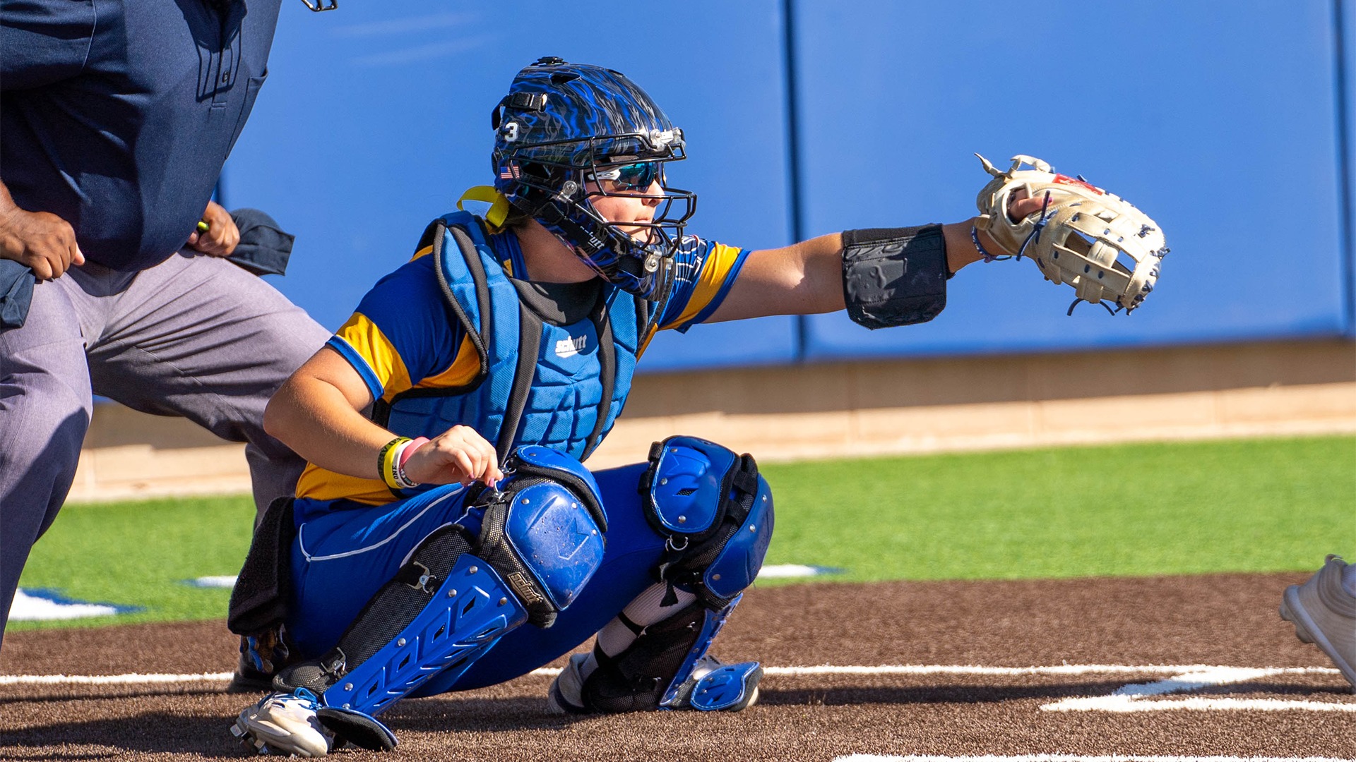 Abby Brand catches a pitch. 