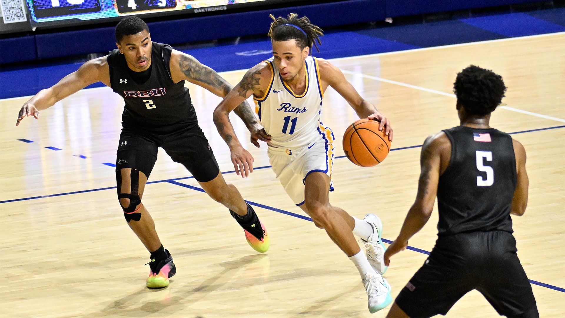 Davon Scott drives the lane vs. DBU