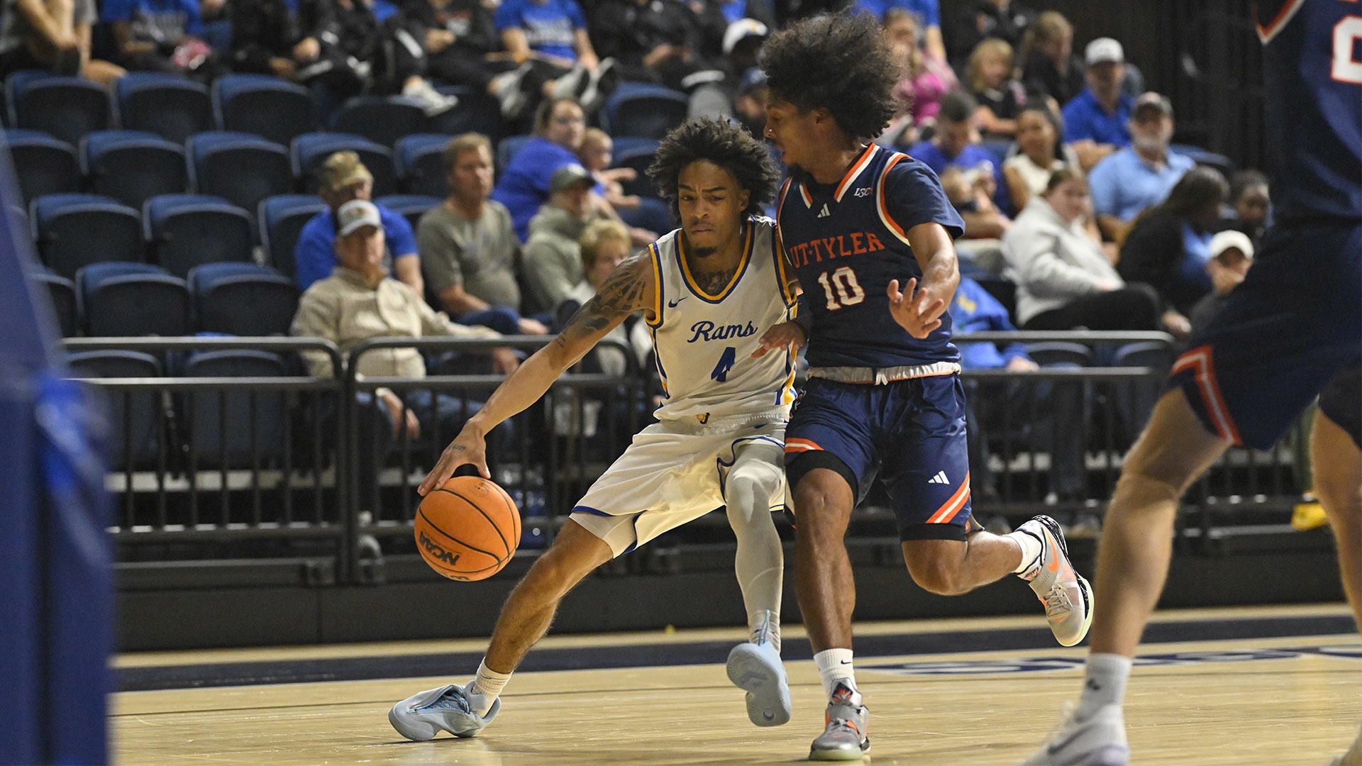 Kailon Nicholls drives baseline vs. UT Tyler