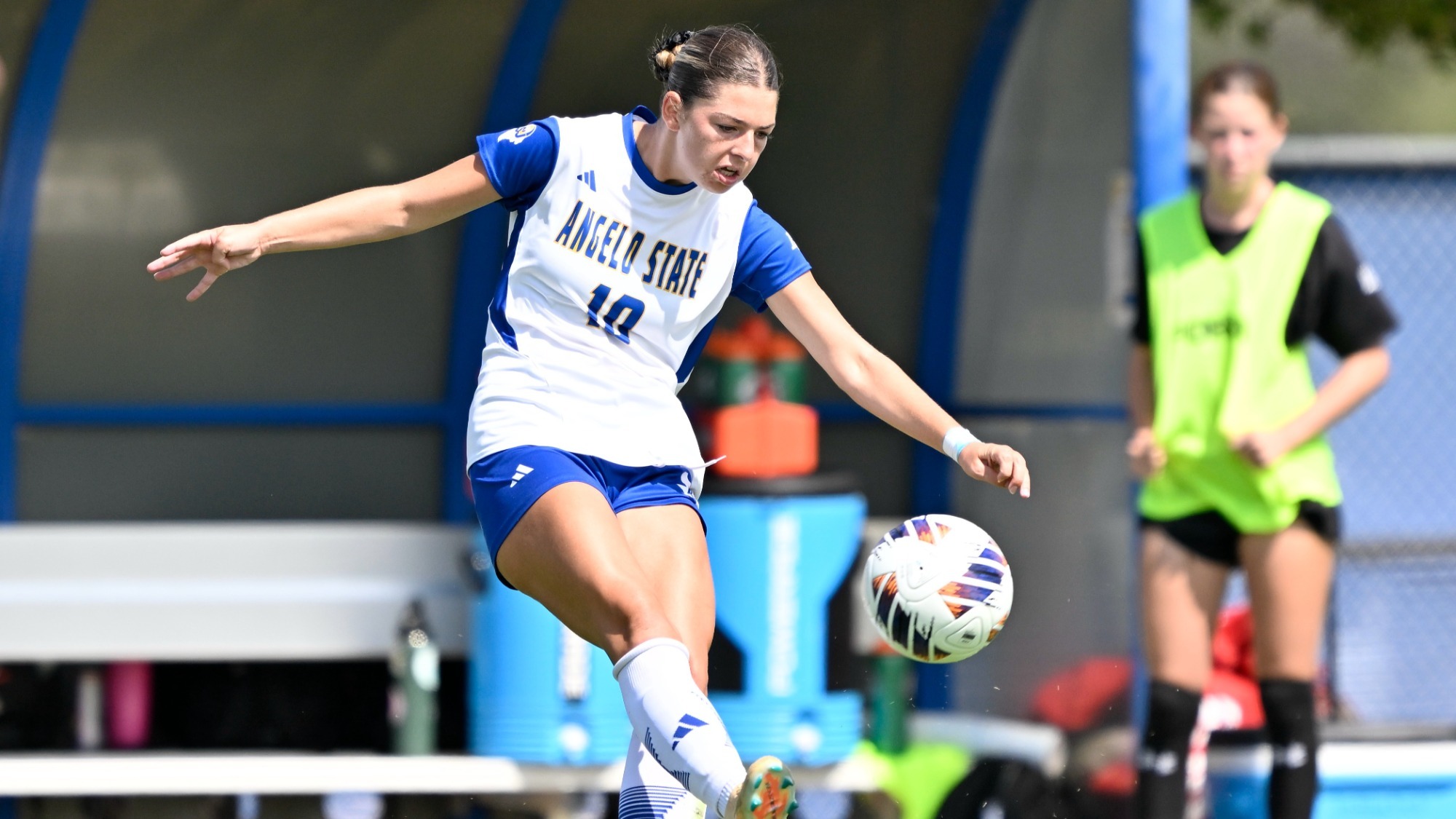 Makenna Deily playing soccer 