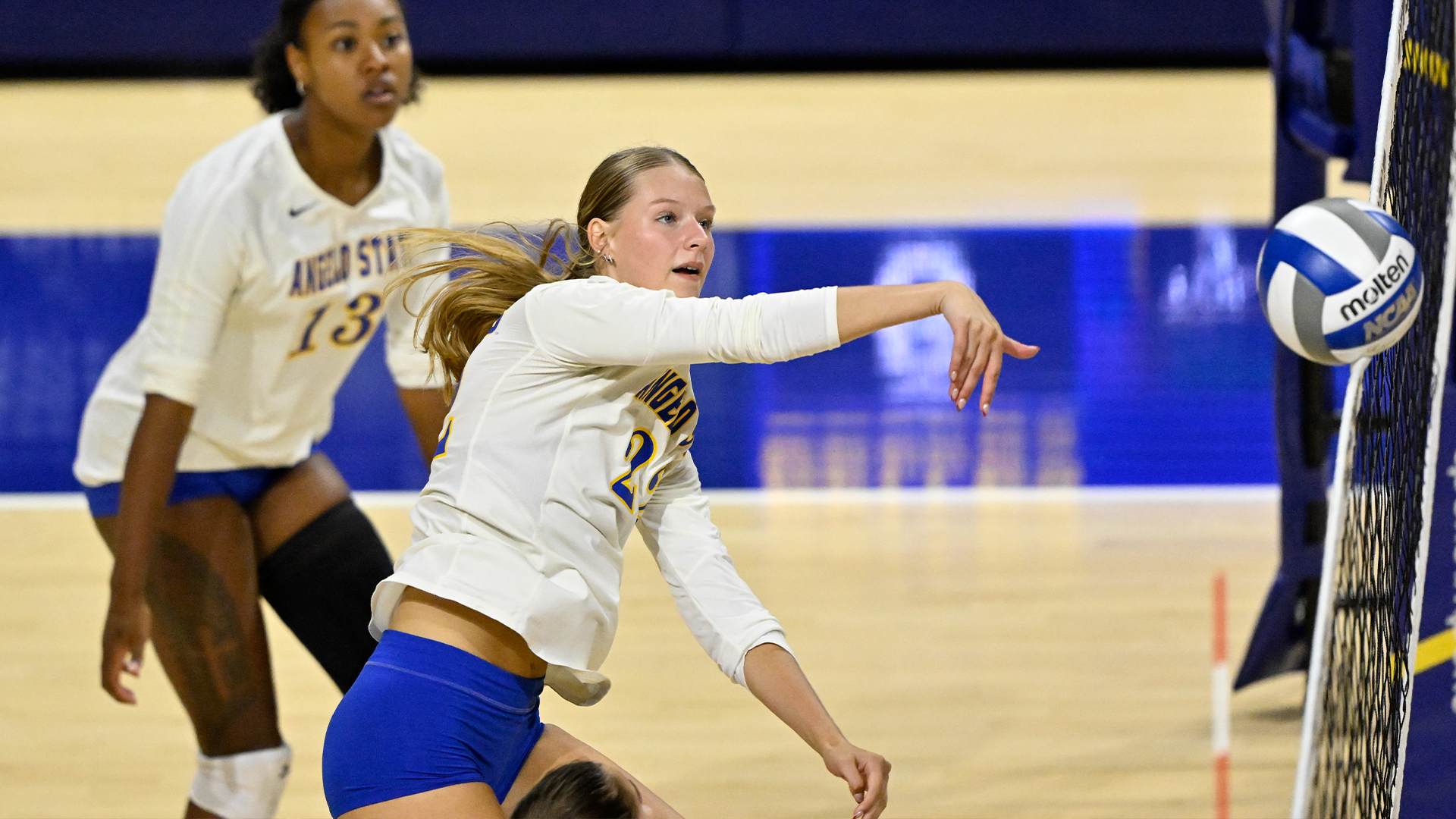 Hannah Barnhill swinging at a volleyball