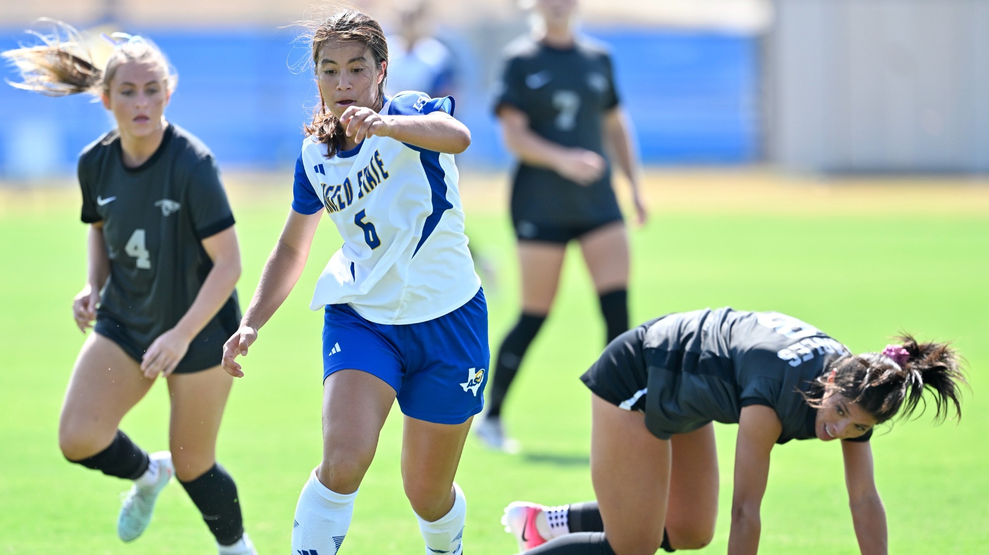 Eleanor Lock playing soccer 