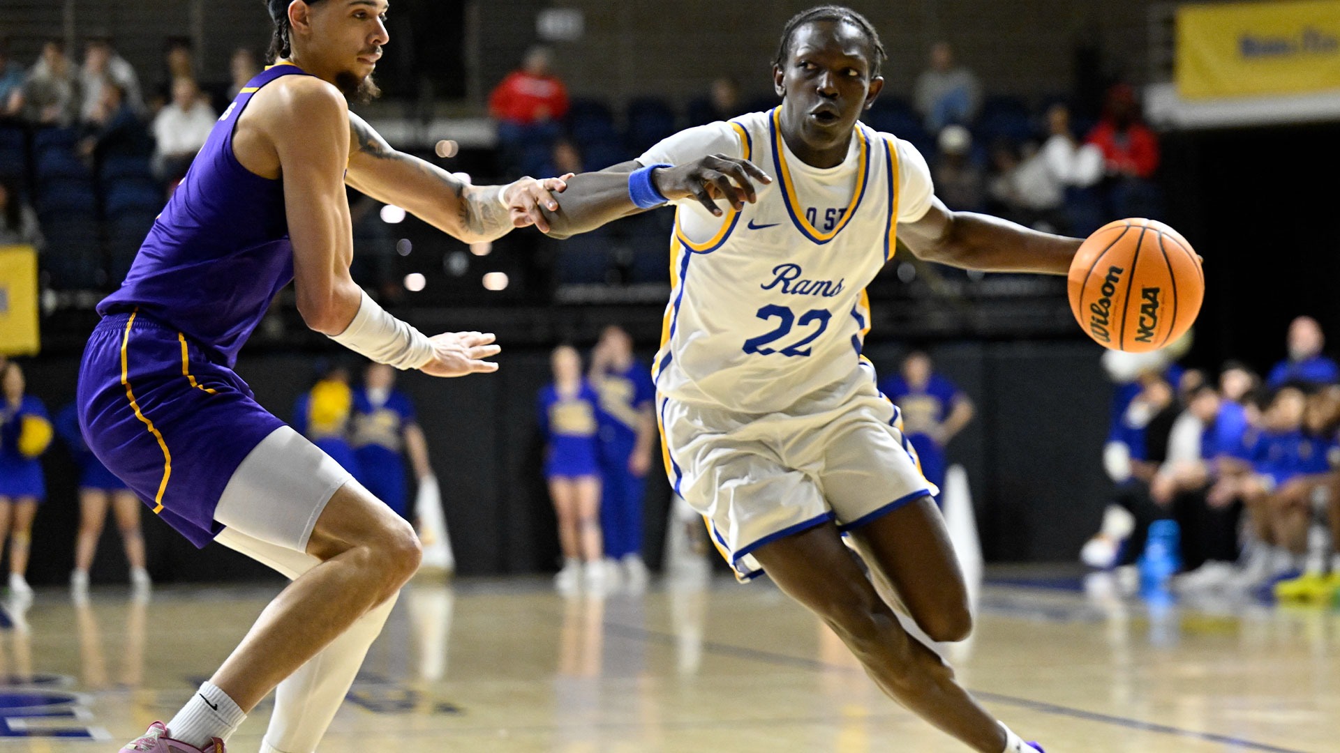Ashraf Barsham drives the lane vs. WNMU