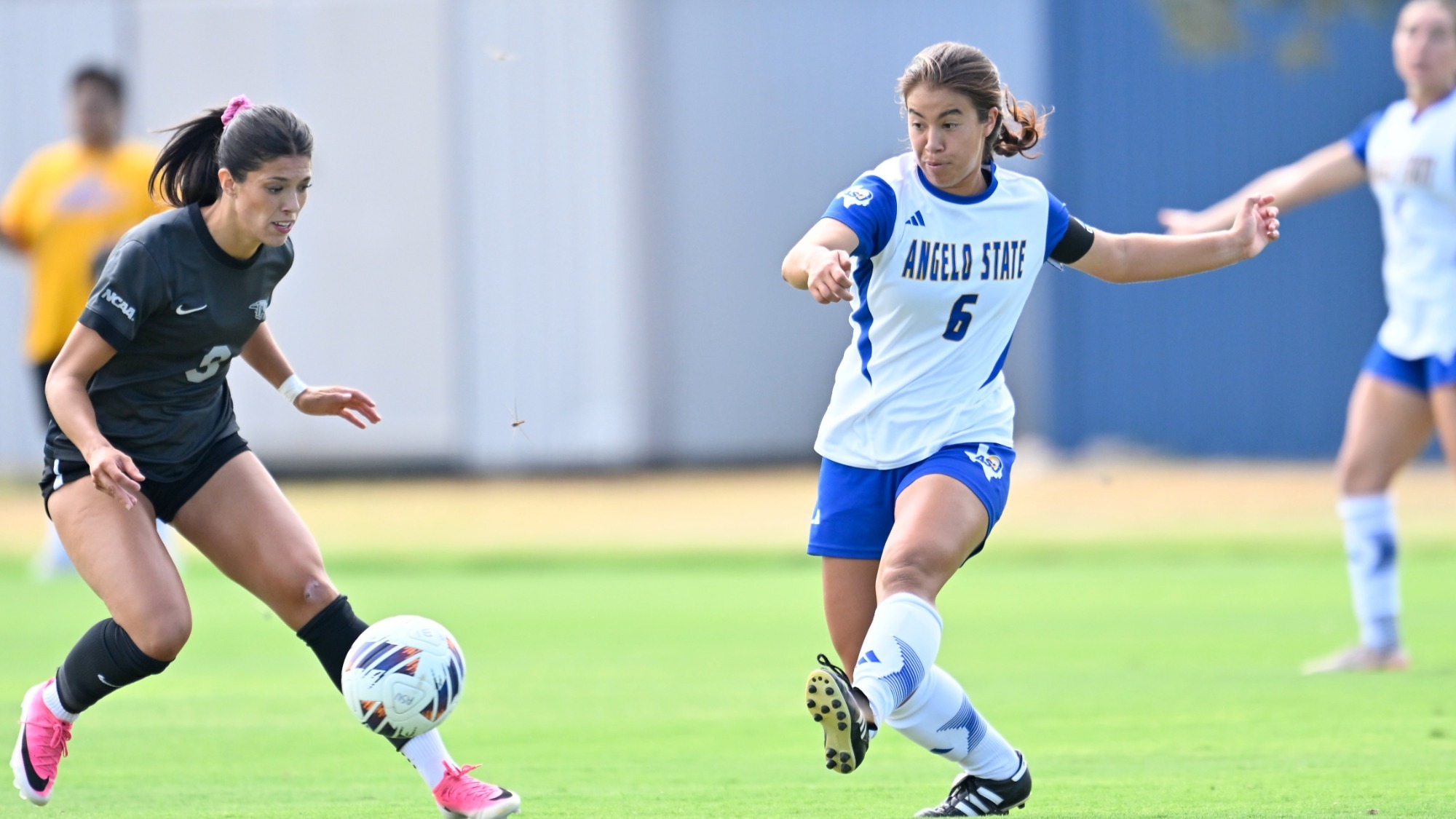 Eleanor Lock playing soccer 