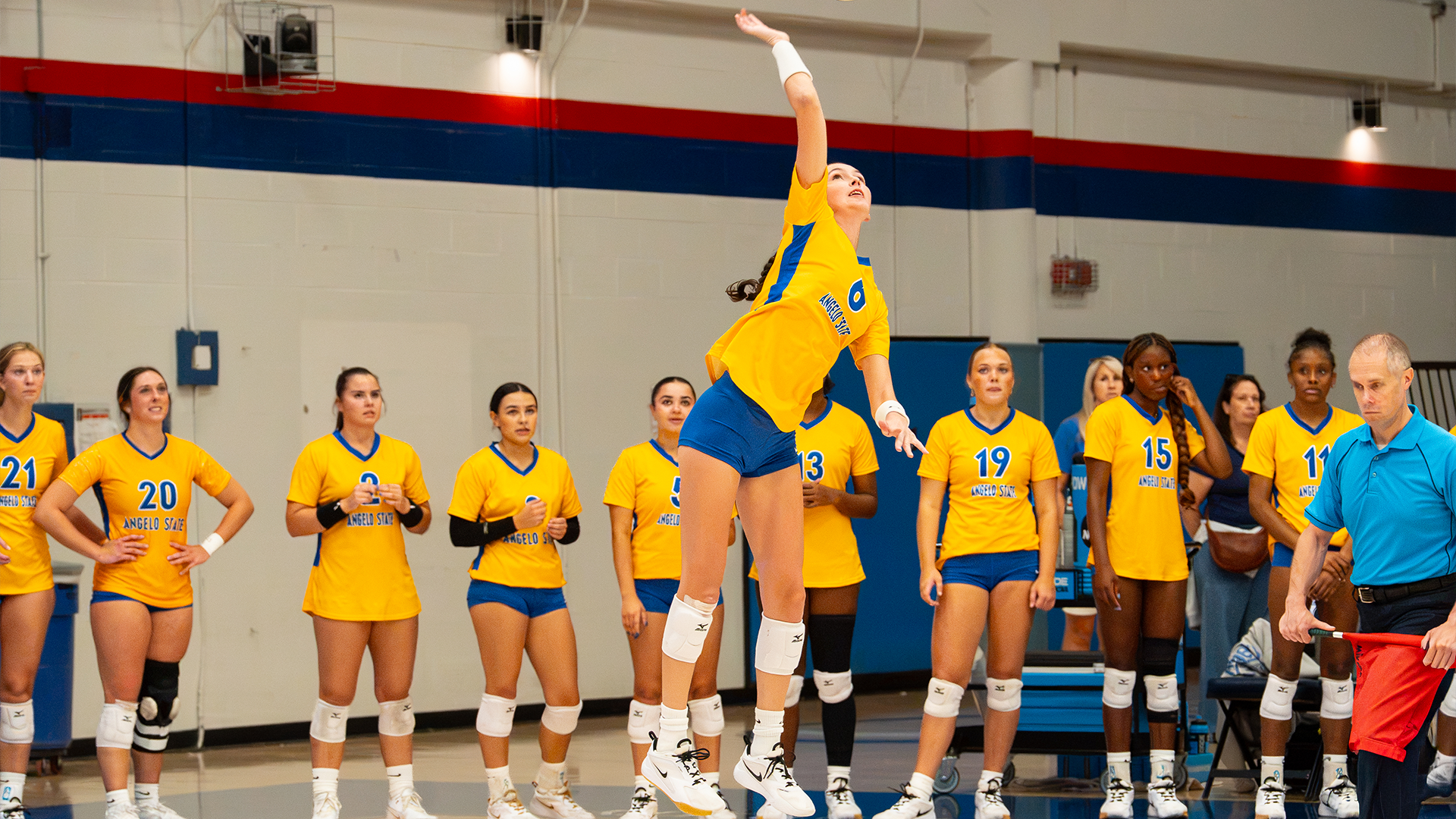 Madi Parrish serving