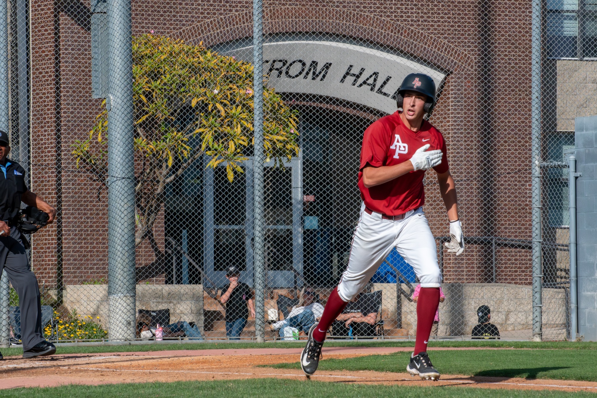 blake hagerty runs to first after a hit 