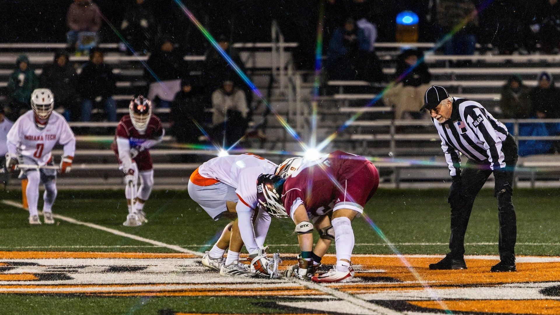 AQ MLax downs IT on road in nail biter 10-9