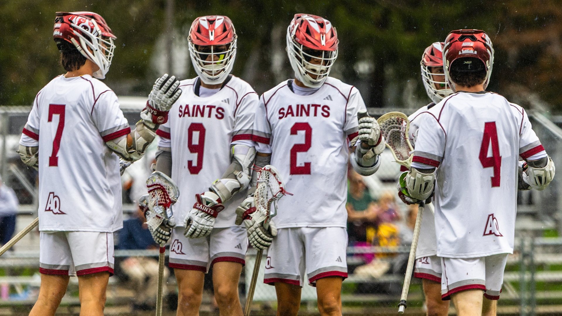 AQ M Lax survives upset bid of LTU