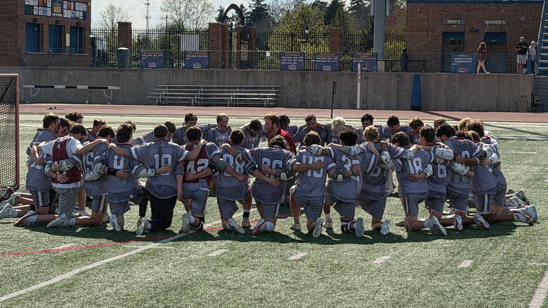 AQ M Lax downs SHU in final battle of the Saints