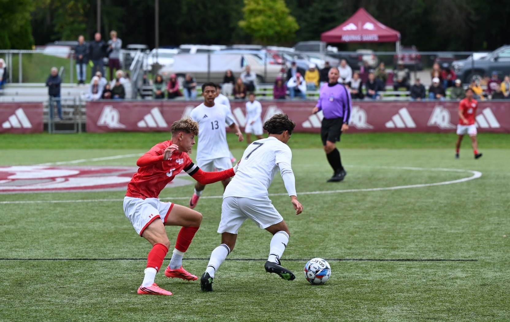 AQ M Soccer comes from behind in 1st WHAC win