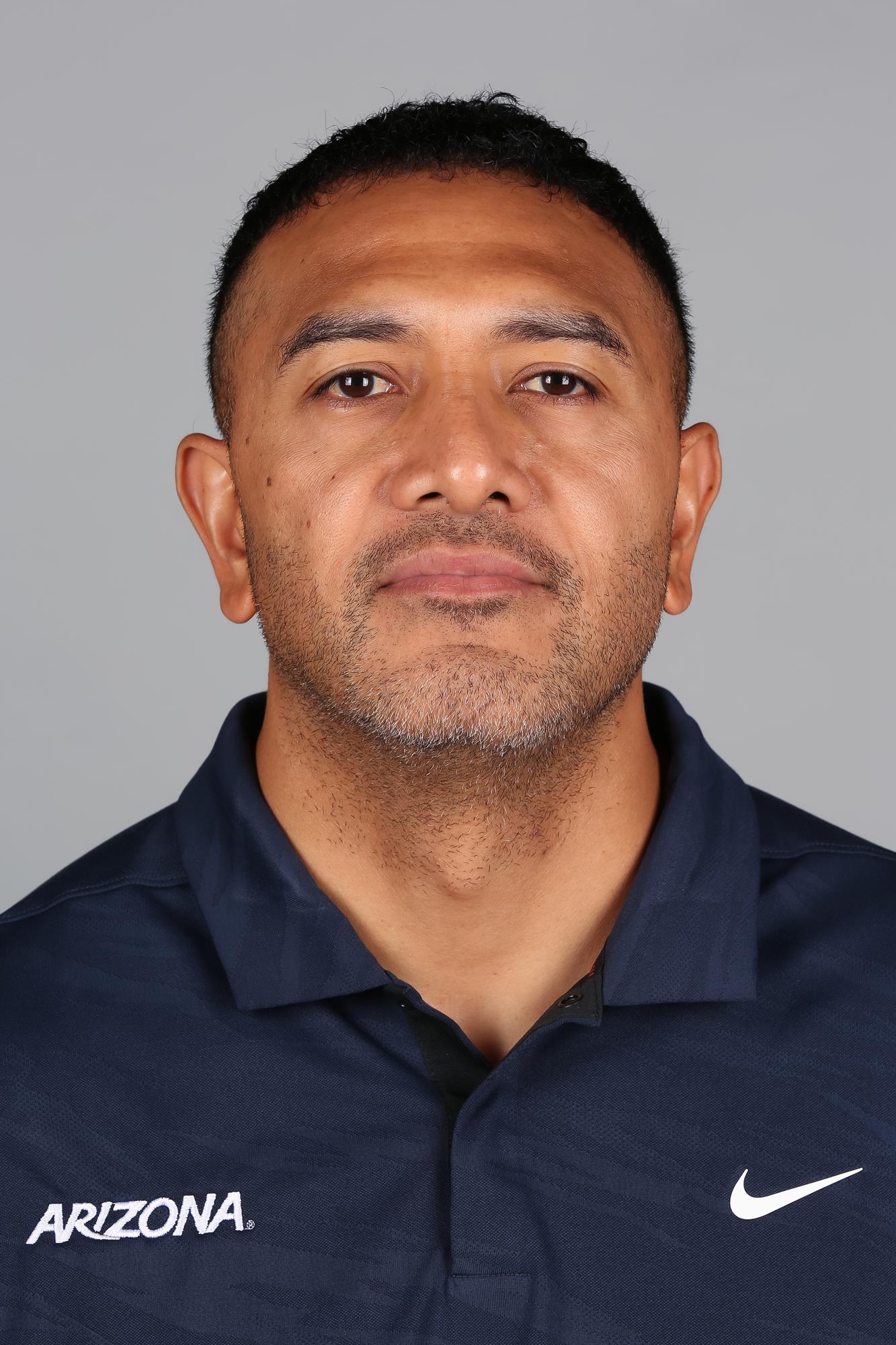 Jason Kaufusi, defensive ends and outside linebackers coach — TUCSON, ARIZ. -- Football newcomer spring headshots.April 2, 2022. Photo by Mike Christy / Arizona Athletics