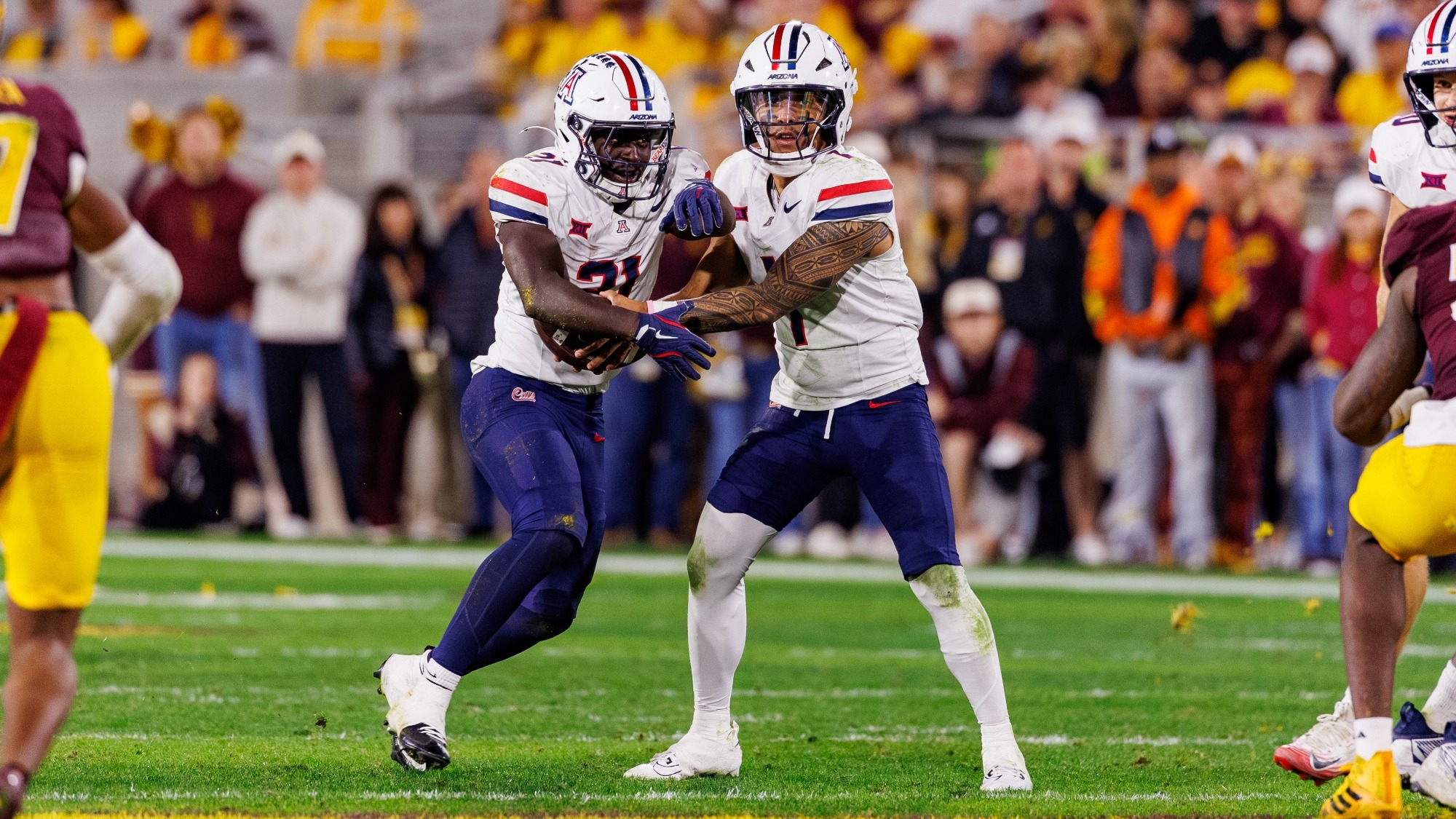 running back Ismail Mahdi (21), quarterback Noah Fifita (1) — TEMPE, ARIZ. -- Football vs. Arizona State University at Mountain America Stadium.

Nov. 28, 2025. 
Photo by Marison Bilagody / Arizona Athletics