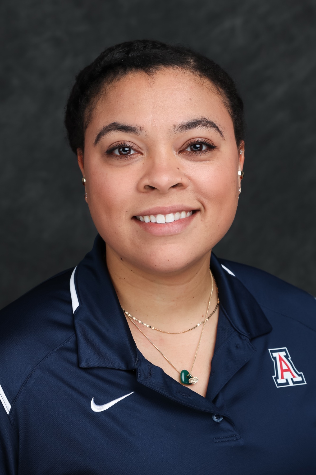 Simone Asque-Favia, assistant coach — TUCSON, ARIZ. -- Volleyball photo day at Photo Studio.

Feb. 5, 2025. 
Photo by Mike Christy / Arizona Athletics