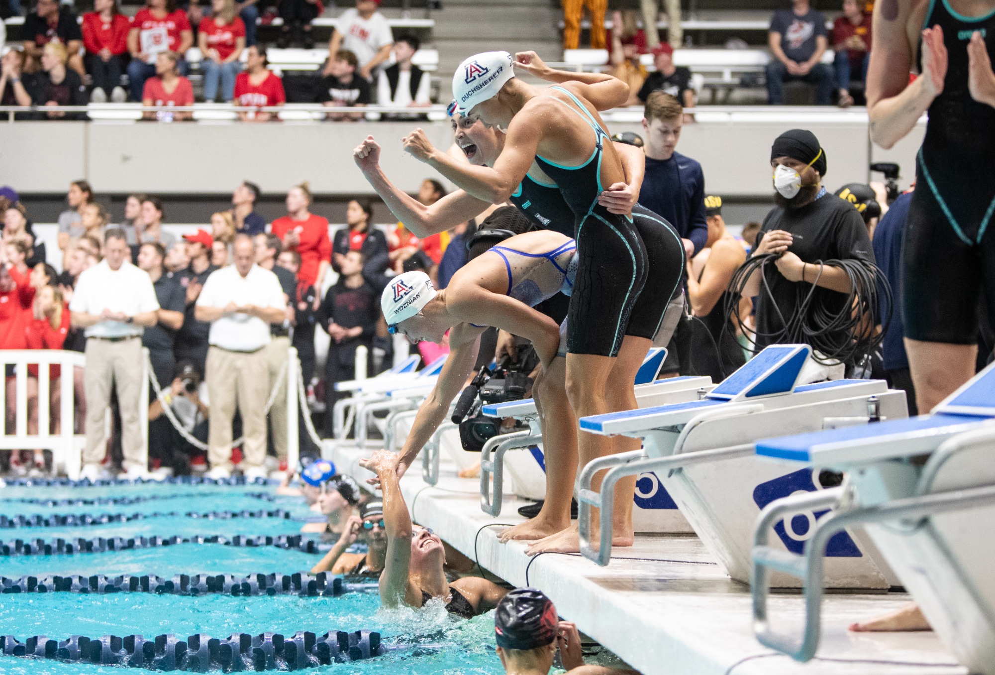 Julia Wozniak, Alyssa Schwengel, Lexi Duchsherer, Riley Botton — FEDERAL WAY, WASH. -- Swimming and diving competes at the 2025 Big 12 Conference Championships at Weyerhaeuser King Country Aquatic Center.March 1, 2025. Photo by Mason Kelley / for Arizona Athletics