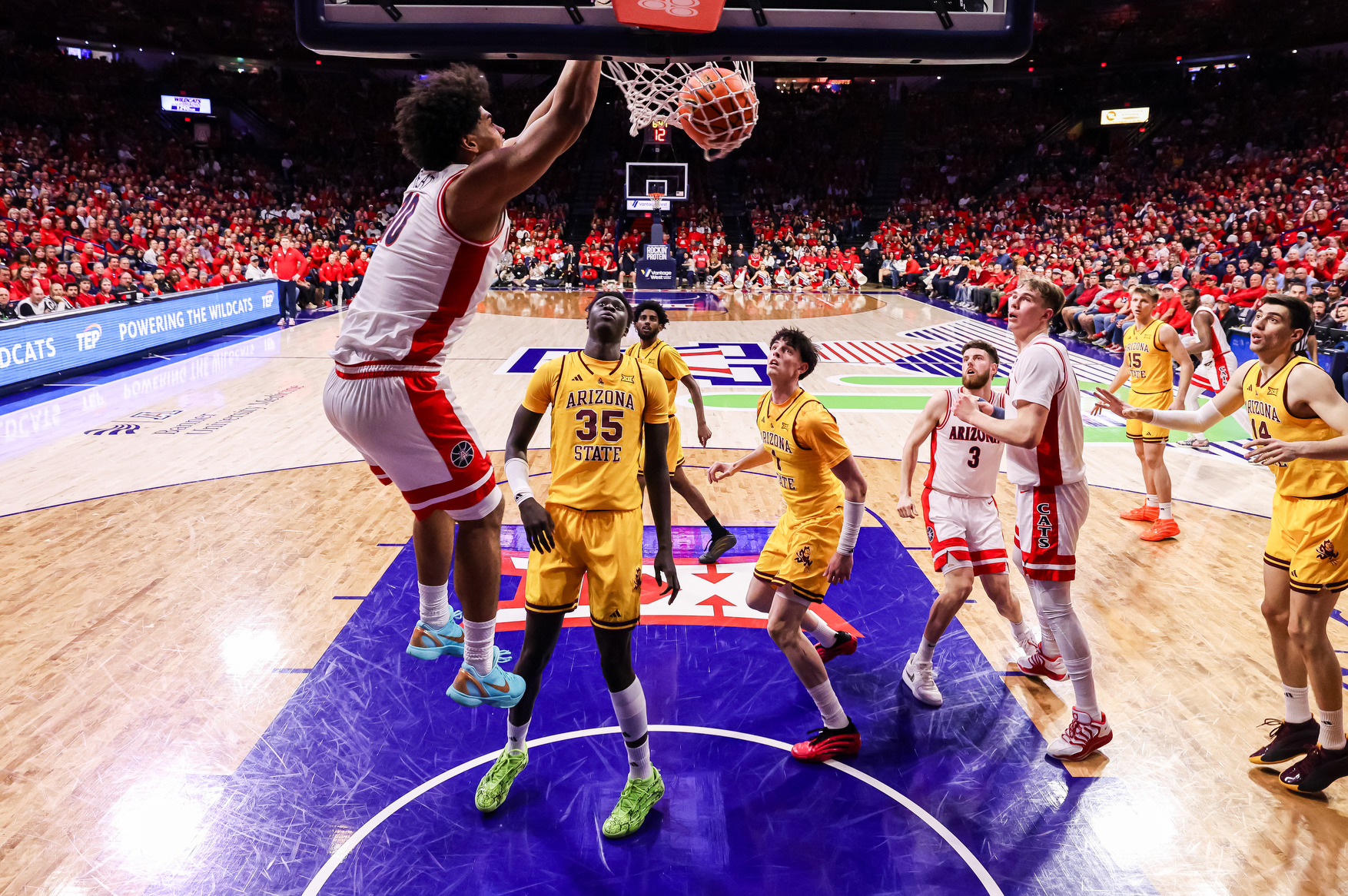Koa Peat (10), Anthony Dell'Orso (3), Motiejus Krivas (13) — TUCSON, ARIZ. -- Men’s basketball vs. Arizona State at McKale Center.Jan. 14, 2026. Photo by Mike Christy / Arizona Athletics
