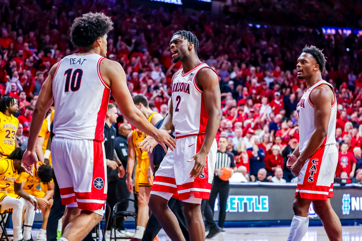Dwayne Aristode (2), Koa Peat (10), Tobe Awaka (30) - TUCSON, ARIZ. -- Men’s Basketball vs Arizona State at McKale Memorial CenterJan. 14, 2026. Photo by Rebecca Sasnett / Arizona Athletics