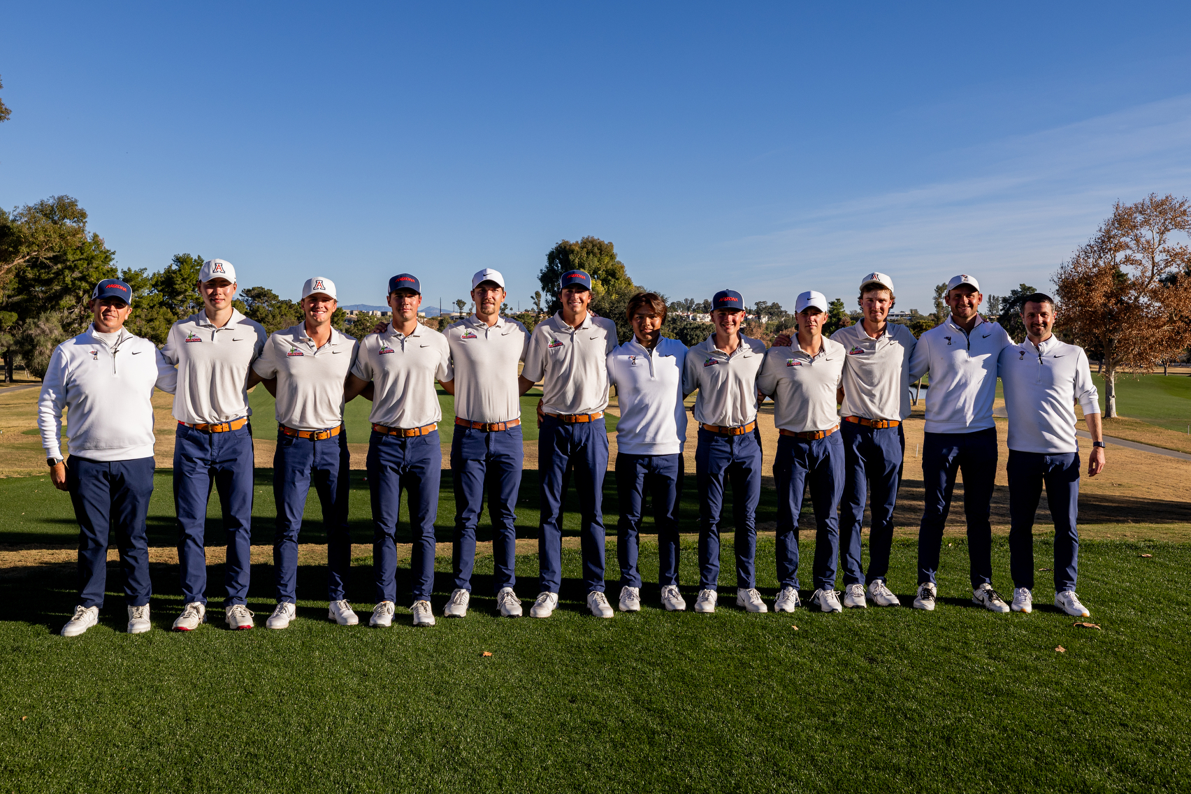 Jim Anderson, head coach, Tianyi Xiong, Connor Hamm, Filip Jakubcik, Matej Baca, Dillon Dean, Taishi Moto, Finn McCall, William Wistrand, Zach Pollo, Jackson Norwich, Matt Walton, assistant coach — TUCSON, ARIZ. -- Men’s Golf competes in Day 2 of the 2026 National Invitational Tournament at Omni Tucson National Resort.Jan. 27, 2026. Photo by Marison Bilagody / Arizona Athletics