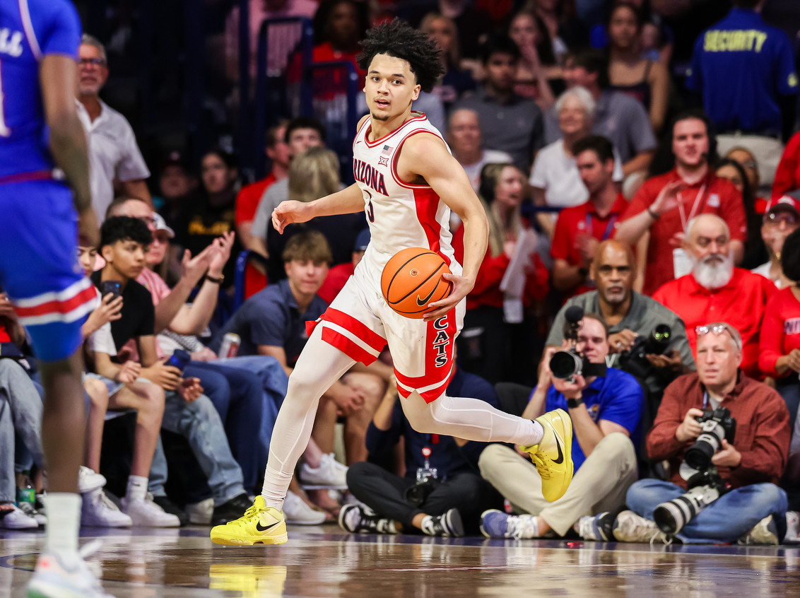 Brayden Burries (5) — TUCSON, ARIZ. -- Men’s basketball vs. Kansas at McKale Center at ALKEME Arena.Feb. 28, 2026. Photo by Mike Christy / Arizona Athletics