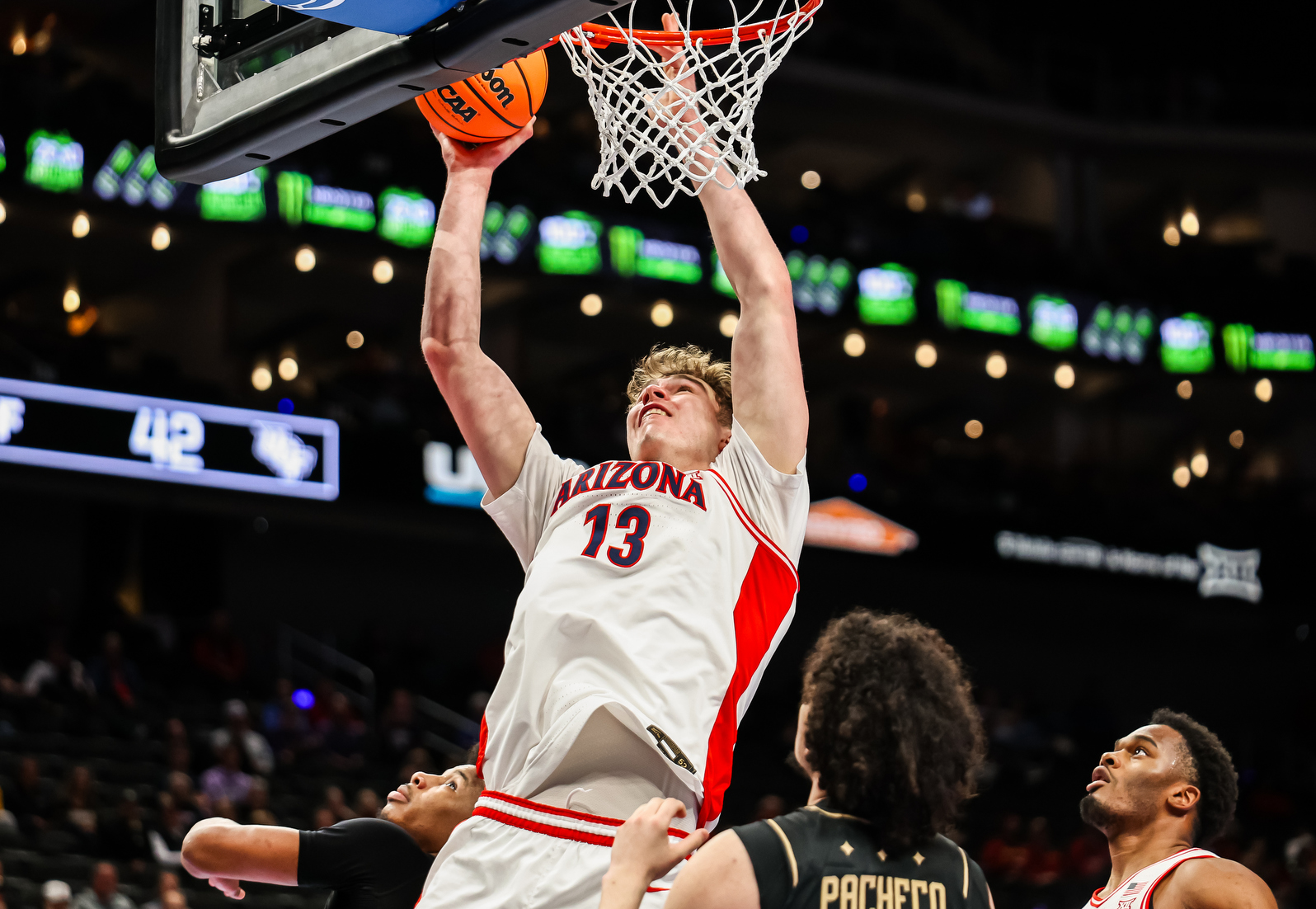 Motiejus Krivas (13) — KANSAS CITY, MO. -- Men’s basketball vs. Central Florida in a Big 12 Conference Tournament quarterfinal game at T-Mobile Center.March 12, 2026. Photo by Mike Christy / Arizona Athletics