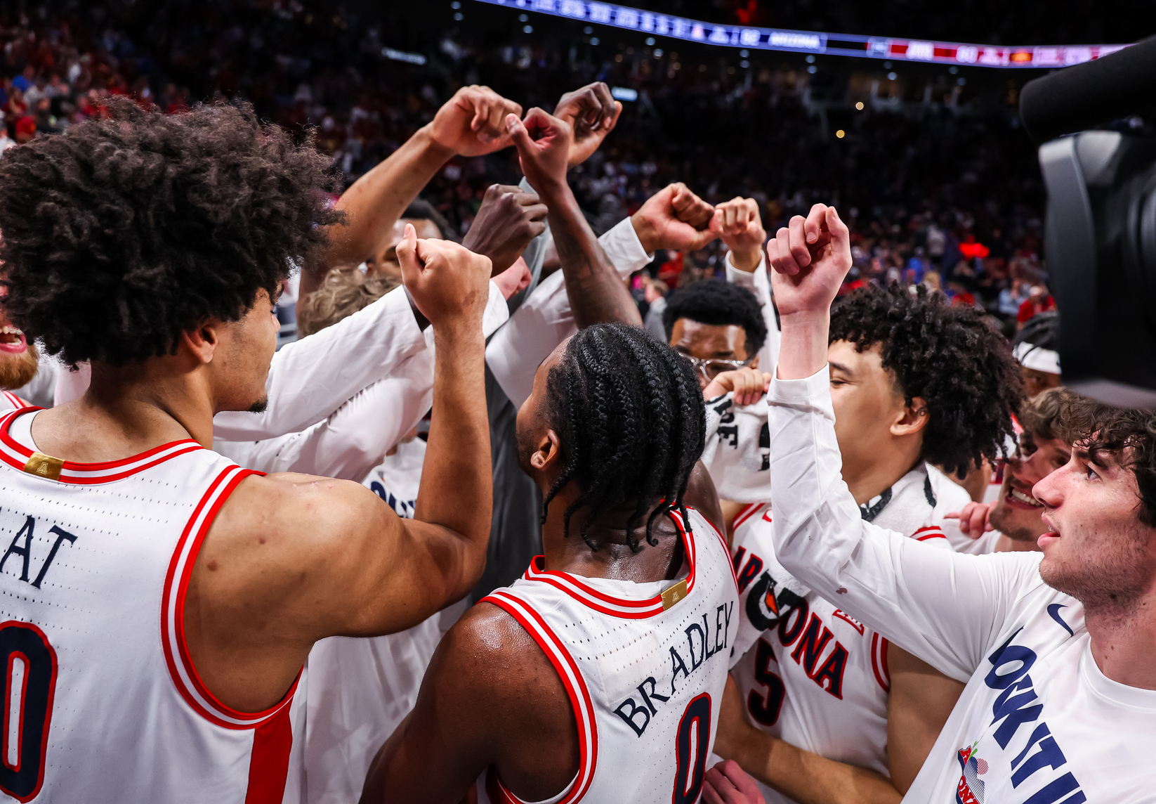 Koa Peat (10), Jackson Cook (11), Jaden Bradley (0), Tobe Awaka (30), Mabil Mawut (20), Brayden Burries (5), Jackson Francois (7) — KANSAS CITY, MO. -- Men’s basketball vs. Iowa State in a Big 12 Conference Tournament semifinal game at T-Mobile Center.March 13, 2026. Photo by Mike Christy / Arizona Athletics