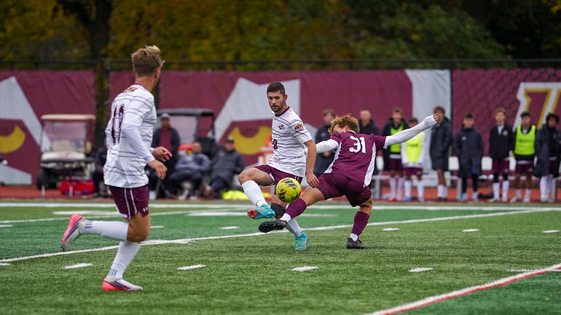 Josh Ertel plays a ball through to Luke Williamson