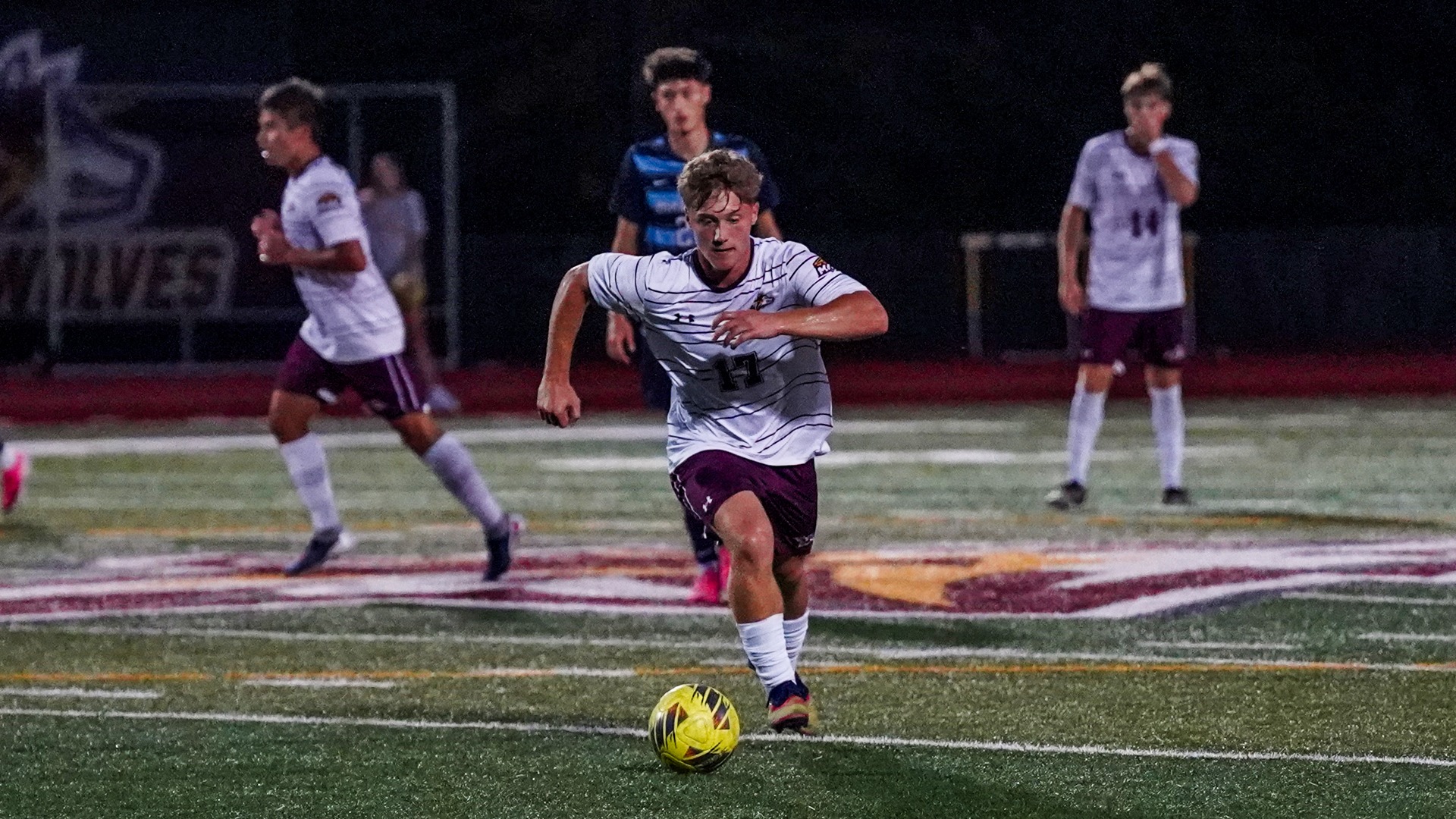 Graeson Reese dribbles up the field against Immaculata