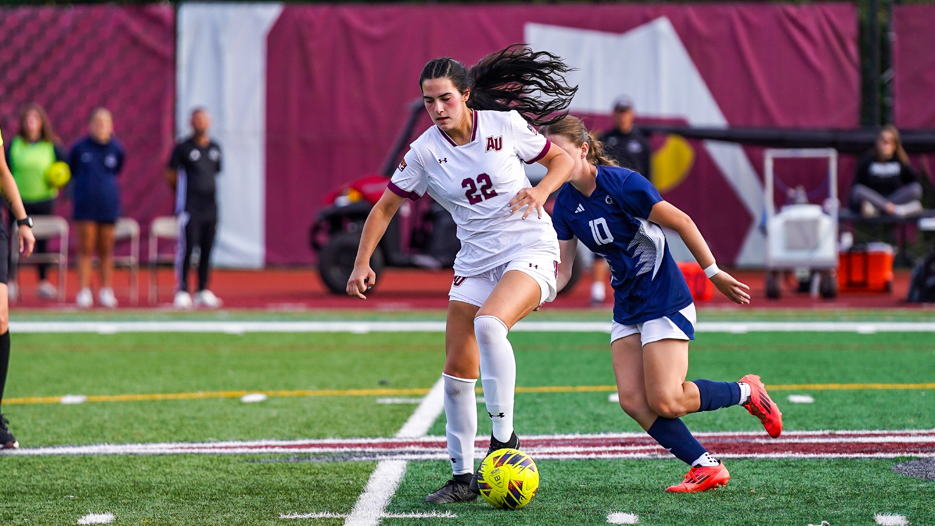 Web photo of Abby Stair dribbling the soccer ball