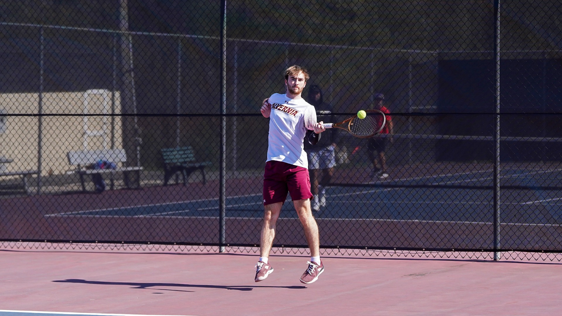 Troy O'Malley returns a serve