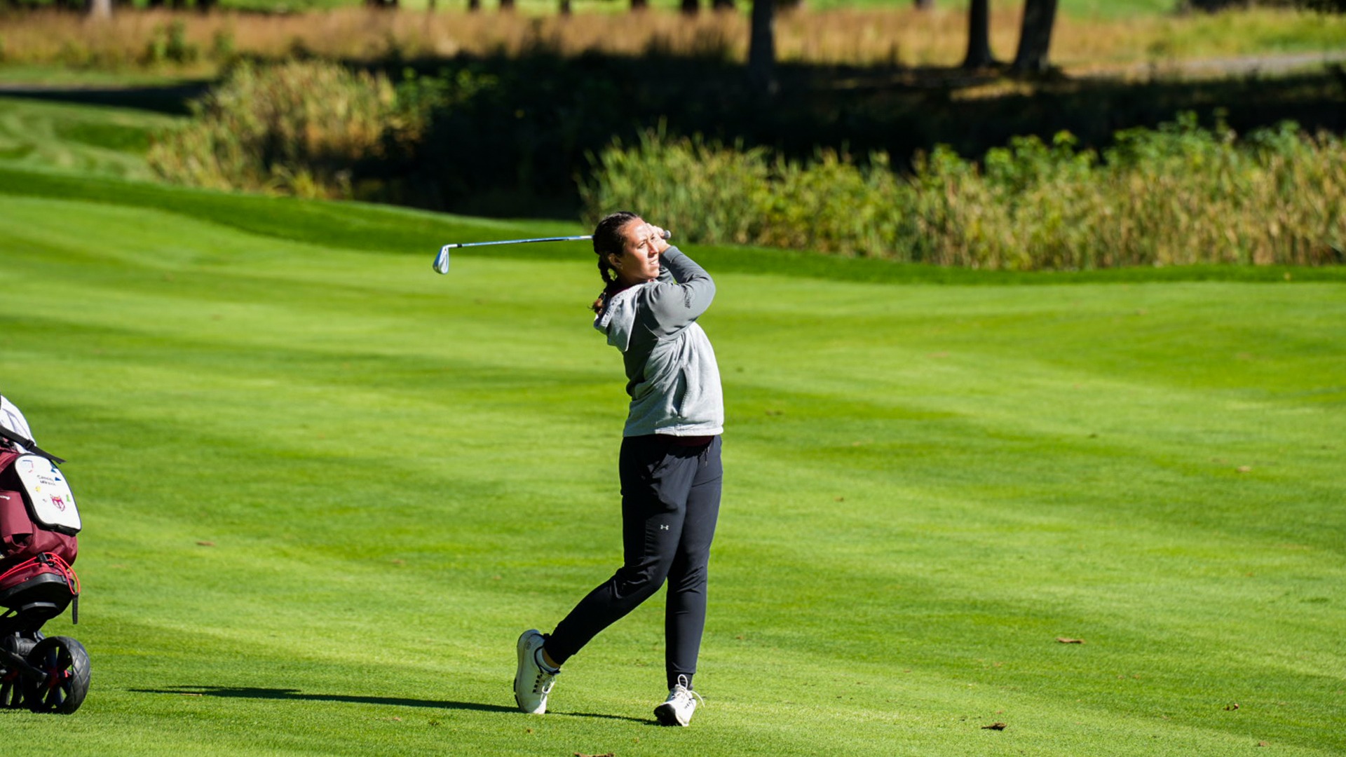 Cassidy Miksich hits an approach shot
